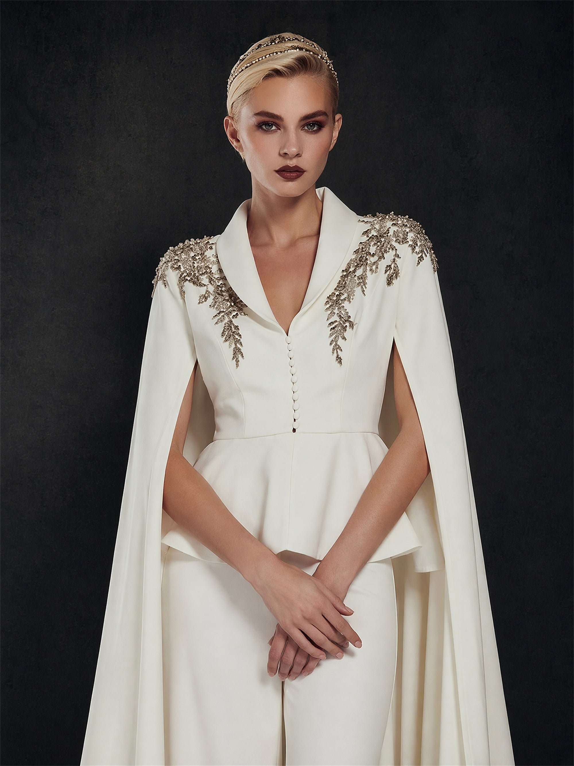 BOLODOO Ivory Gold Leaf Rhinestone Peplum Jumpsuit with Floor-Length Cape - Front Upper Body Close-up Gold Leaf Rhinestone Embroidery Detail