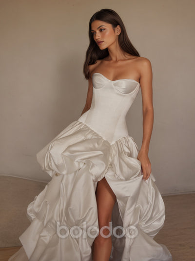 BOLODOO Ivory Strapless Sweetheart Boned Corset Satin Sculptural Ruffle Ball Gown - front bodice close-up with slit | BOLODOO watermark