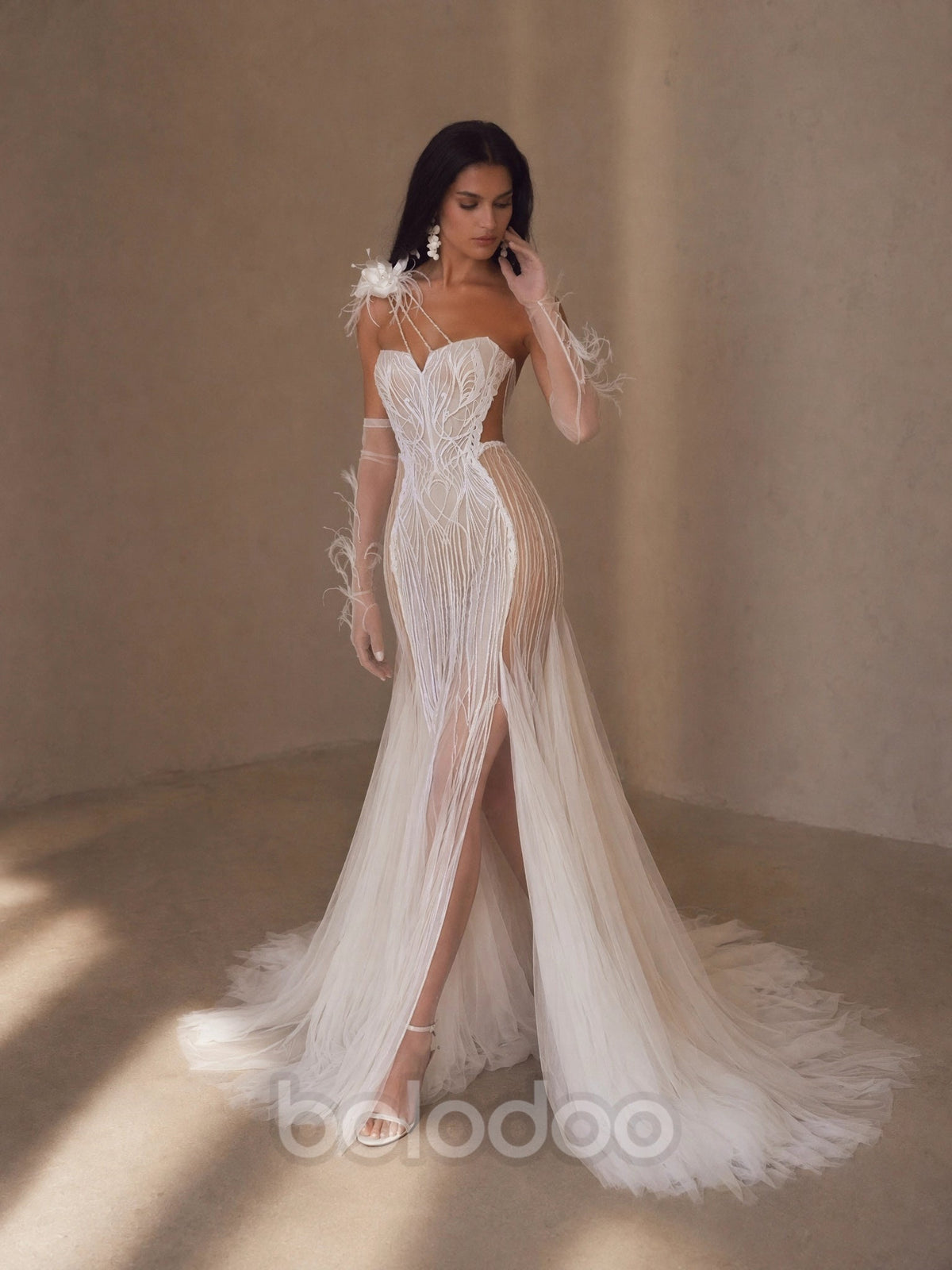 BOLODOO Ivory Strapless Sweetheart Beaded Line Embroidered Feather Trim Mermaid Wedding Gown - front view 2 with slit and feather gloves | BOLODOO watermark