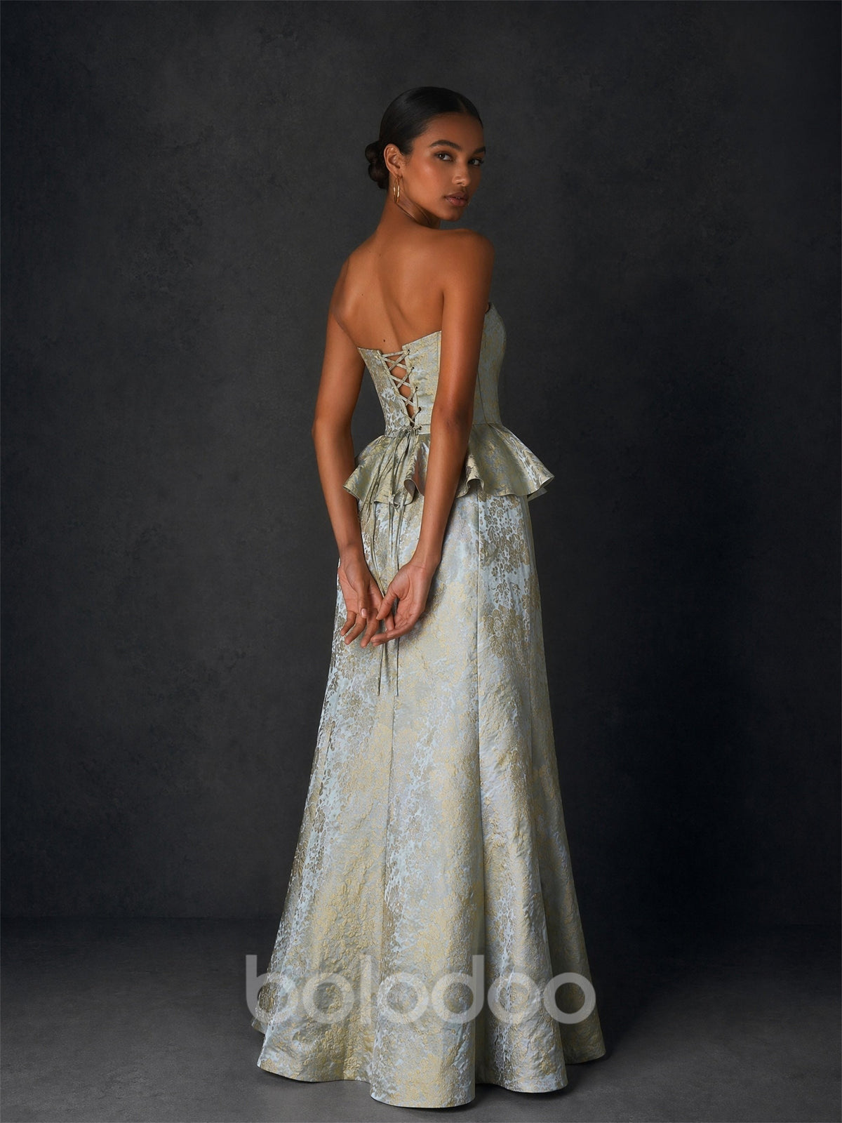 BOLODOO ice blue gold jacquard strapless peplum mermaid gown - front walking view showing movement and floor-sweeping mermaid hem | BOLODOO watermark