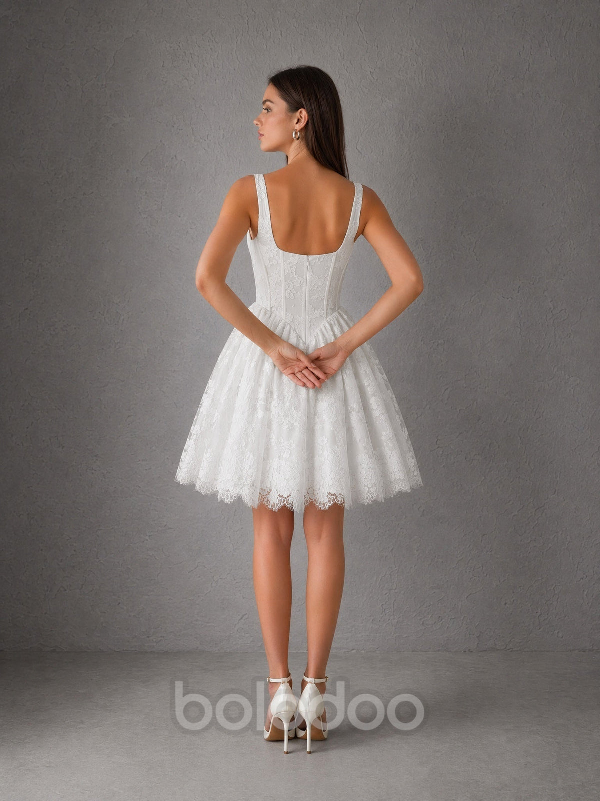 BOLODOO white lace corset mini wedding dress - back view showing open square back and scalloped lace hem | BOLODOO watermark