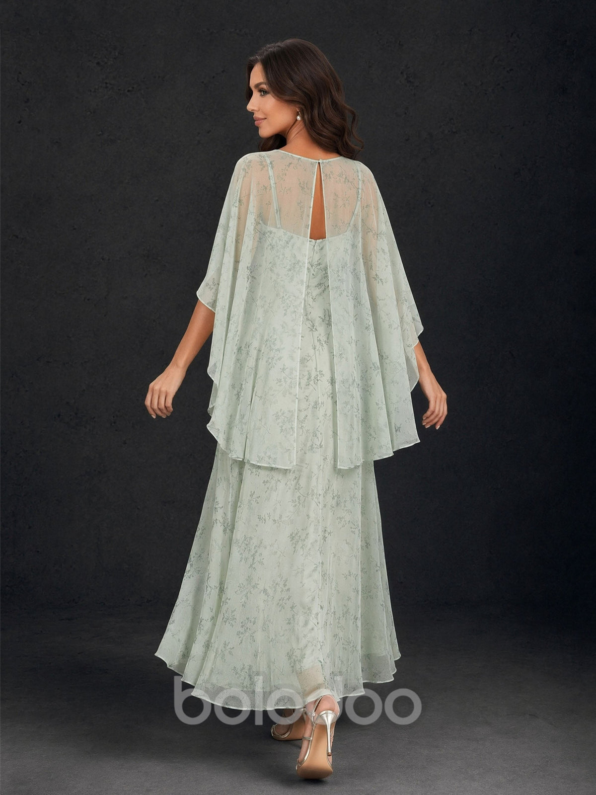 BOLODOO Sage Green Floral Chiffon Illusion Neck Cape Sleeve A-Line Maxi Dress - Front Three Quarter Looking Down View | BOLODOO watermark