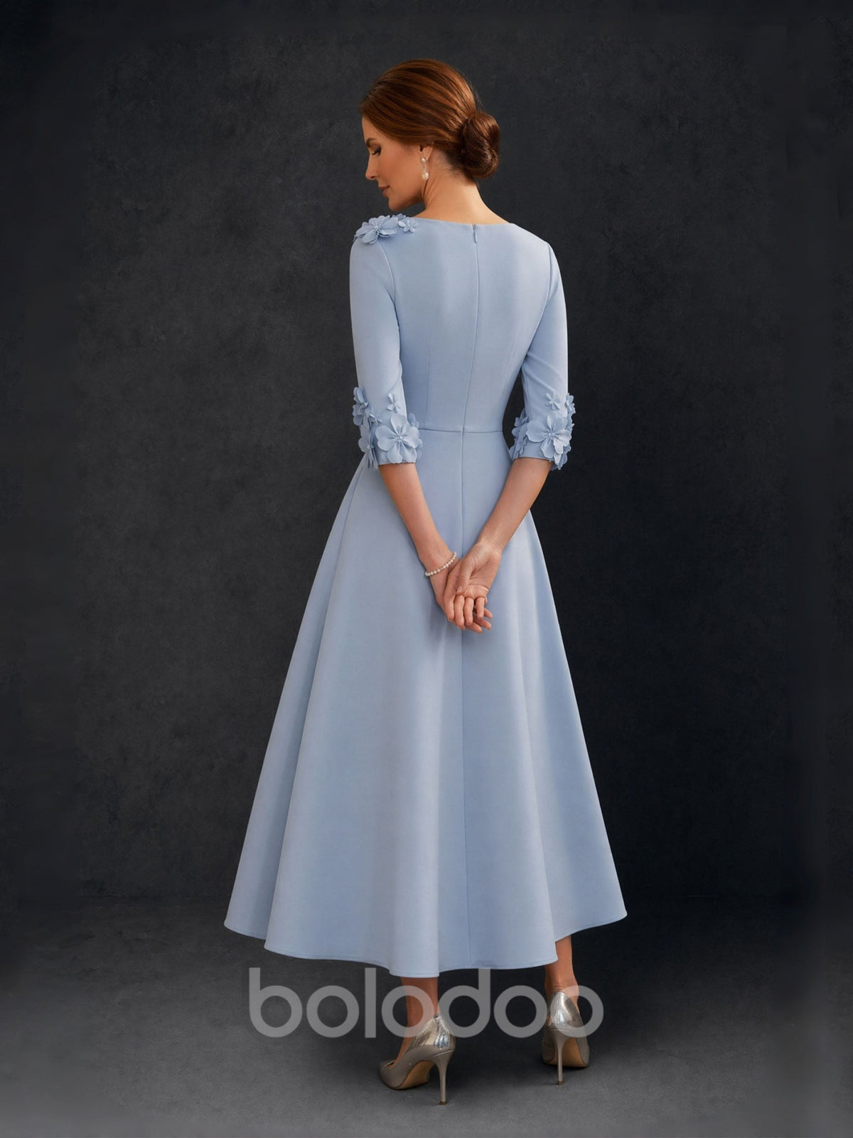 BOLODOO Dusty Blue 3D Floral V-Neck Three Quarter Sleeve A-Line Tea Length Dress - Back View showing A-Line Silhouette and 3D Floral Sleeve Cuffs | BOLODOO watermark