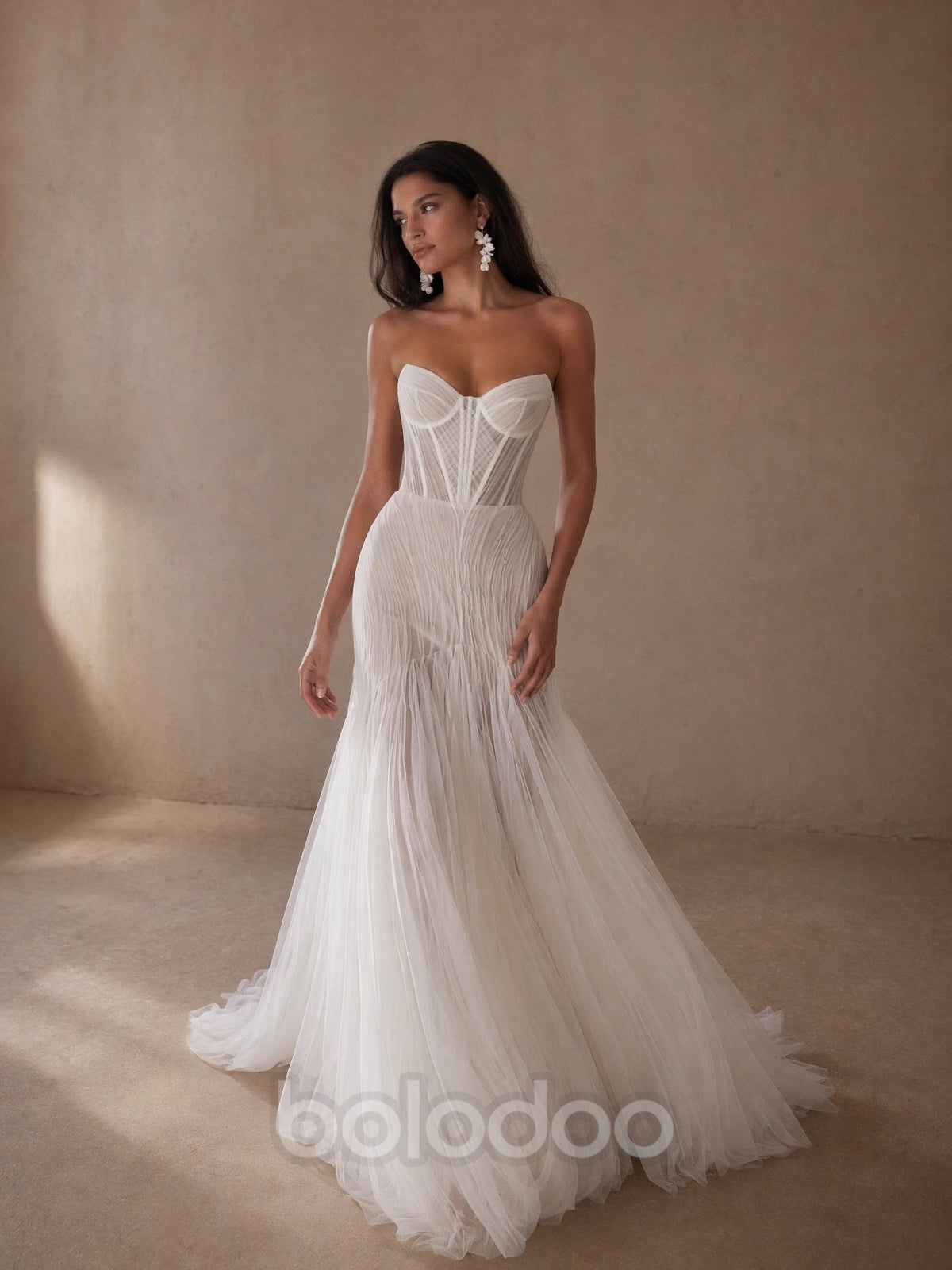 BOLODOO ivory sheer boned corset strapless sweetheart pearl fringe mermaid wedding dress - front close up bodice and pearl fringe detail | BOLODOO watermark