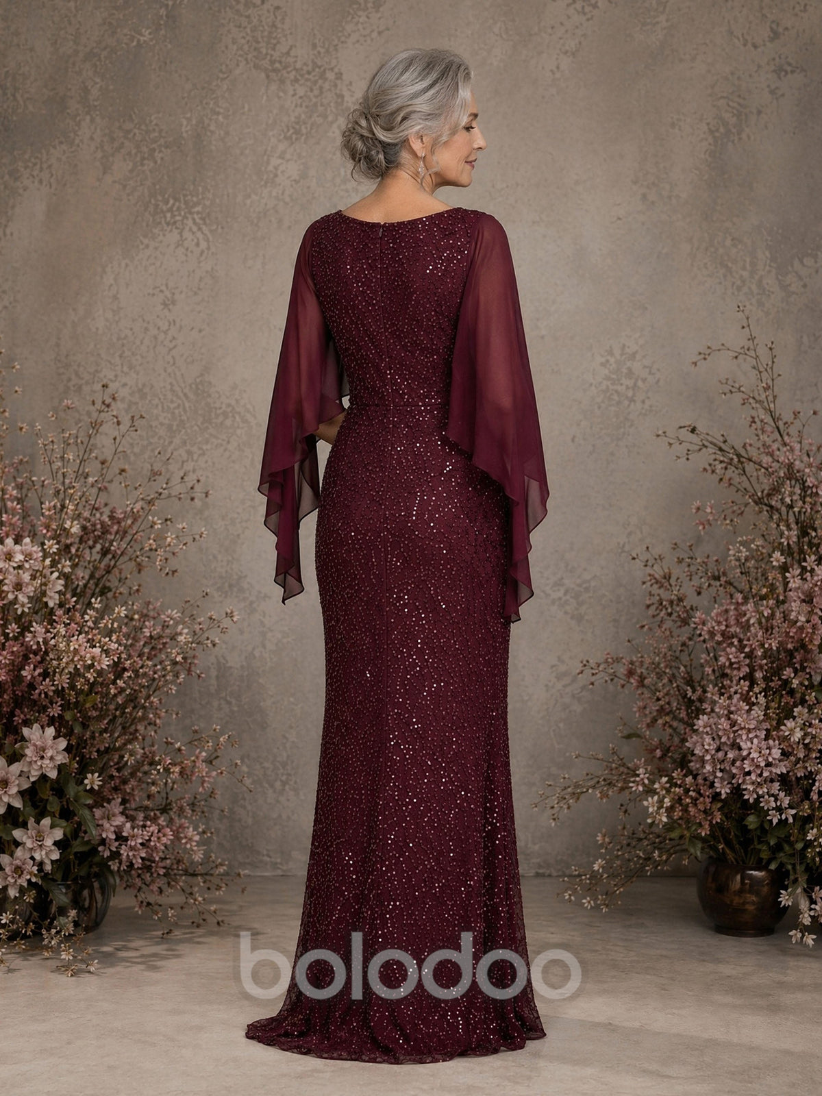 BOLODOO Burgundy Sequin Lace Cape Sleeve Sheath Formal Gown - Back View Showing Cape and Sweep Train | BOLODOO watermark