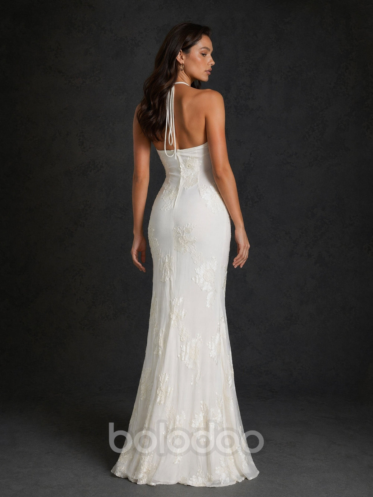 BOLODOO Ivory Tonal Floral Embroidered Mesh Halter Neck 3D Floral Corsage Open Back Mermaid Wedding Dress - Front Full Length Standing View | BOLODOO watermark