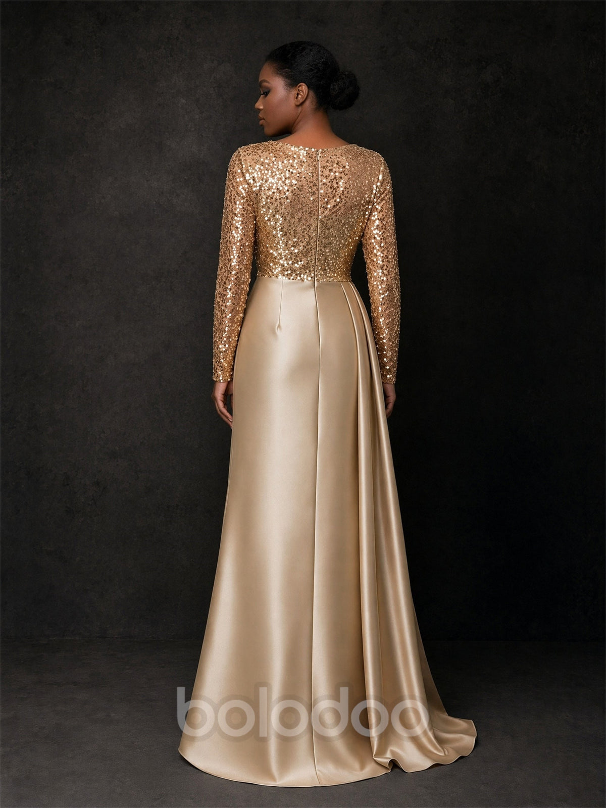 BOLODOO BD0371 gold sequin long sleeve satin evening gown - front full-length view showing A-line silhouette and crystal leaf appliqué at hip | BOLODOO watermark
