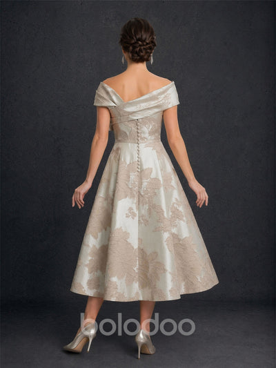 BOLODOO Champagne Gold Jacquard Off-Shoulder A-Line Tea Length Dress – Asymmetric Bow Cap Sleeve Button Back | BOLODOO watermark
