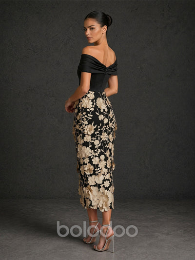 BOLODOO BD0422 black and champagne gold off-shoulder twisted V-neck 3D floral appliqué tea length dress – back view showing open back with twisted knot detail and champagne gold floral embroidered skirt | BOLODOO watermark