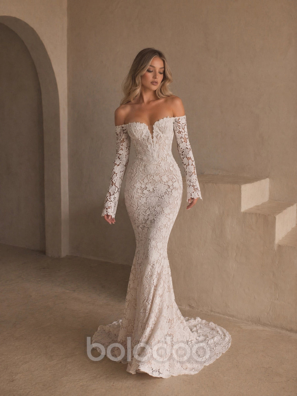 BOLODOO Ivory Off-Shoulder Long Sleeve All-Over Lace Mermaid Wedding Gown - front view 2 with train | BOLODOO watermark