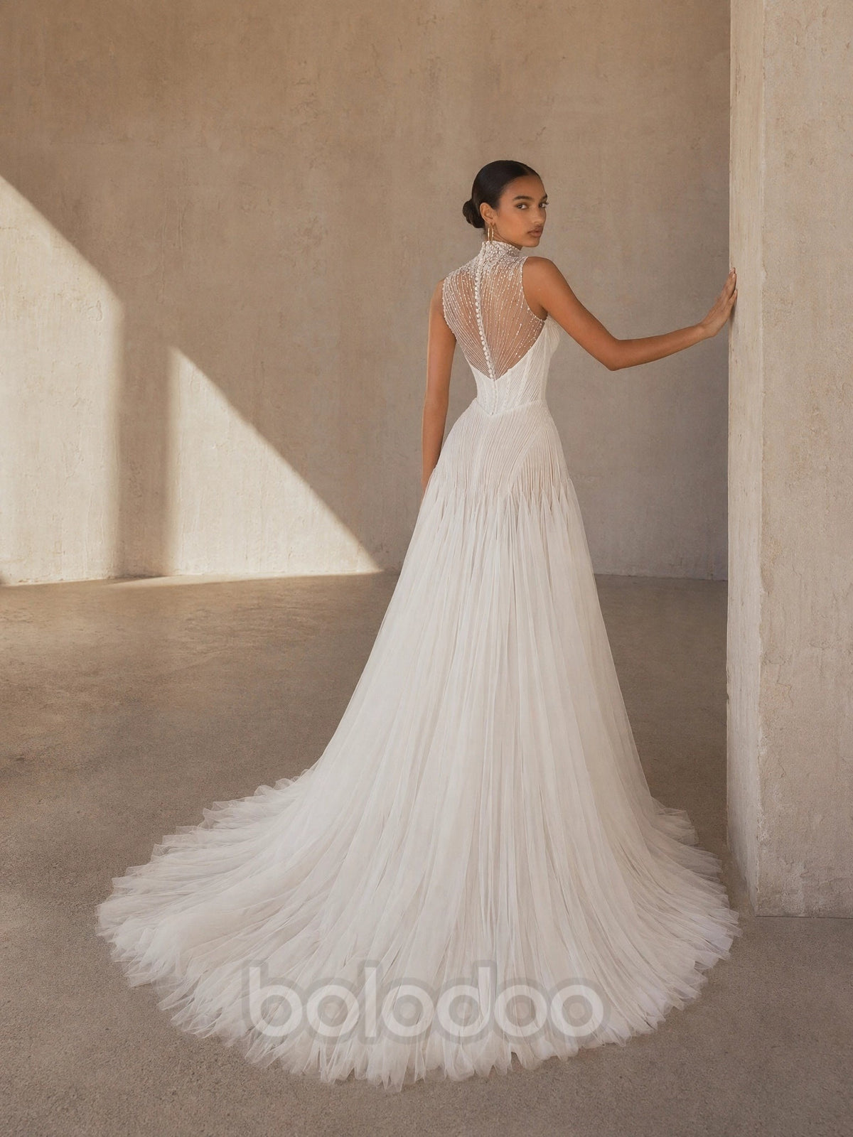 BOLODOO White High Neck Sheer Crystal Beaded Boned Corset A-Line Tulle Wedding Gown - back view sheer crystal beaded open back with train | BOLODOO watermark