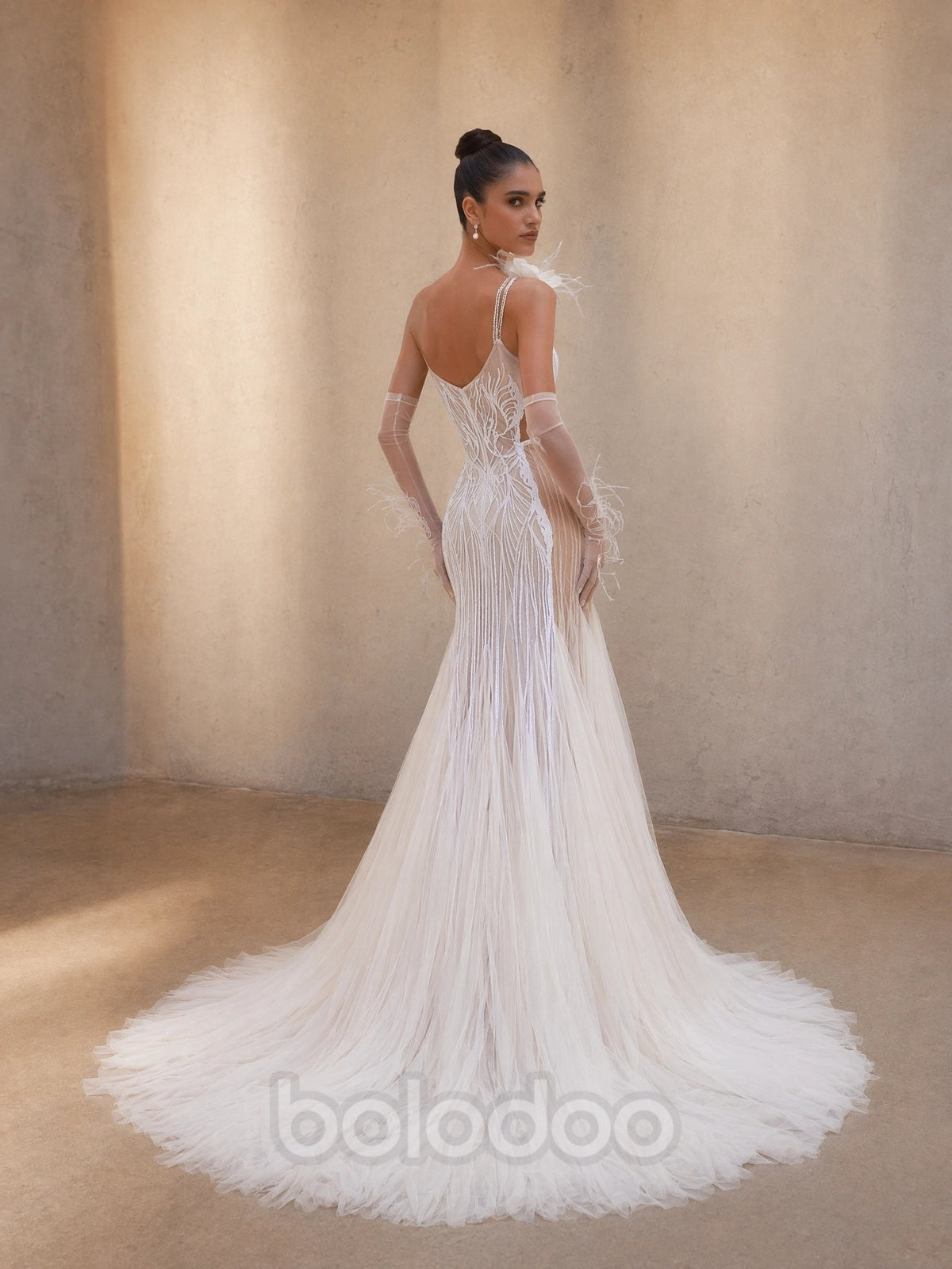 BOLODOO Ivory Radiating Beaded Fringe Mermaid Wedding Gown - back view open back with sweeping tulle train and feather arm sleeves | BOLODOO watermark