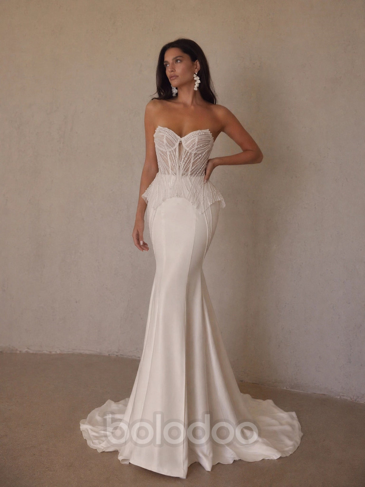 BOLODOO White Radiating Crystal Beaded Sheer Boned Corset Feather Peplum Satin Mermaid Wedding Gown - front view 2 with feather peplum detail | BOLODOO watermark