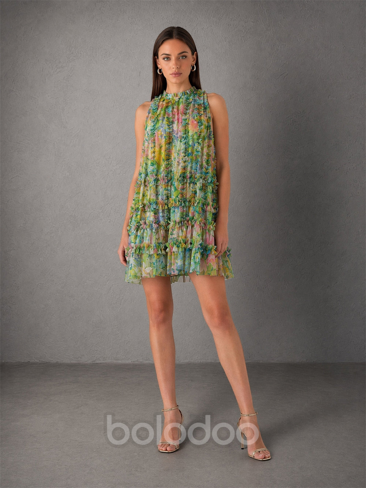 BOLODOO green floral chiffon ruffle mini dress - front view showing full A-line silhouette with tiered ruffles and tropical floral print | BOLODOO watermark