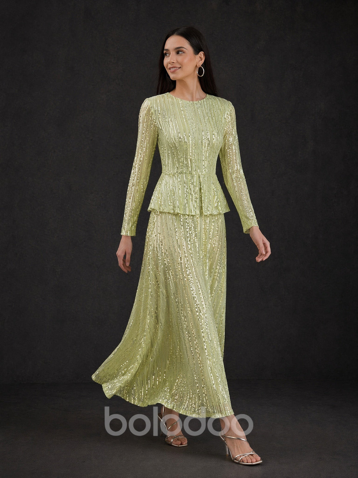 BOLODOO Sage Green Sequin Long Sleeve Peplum Maxi Dress - Front View with Flowing Skirt | BOLODOO watermark