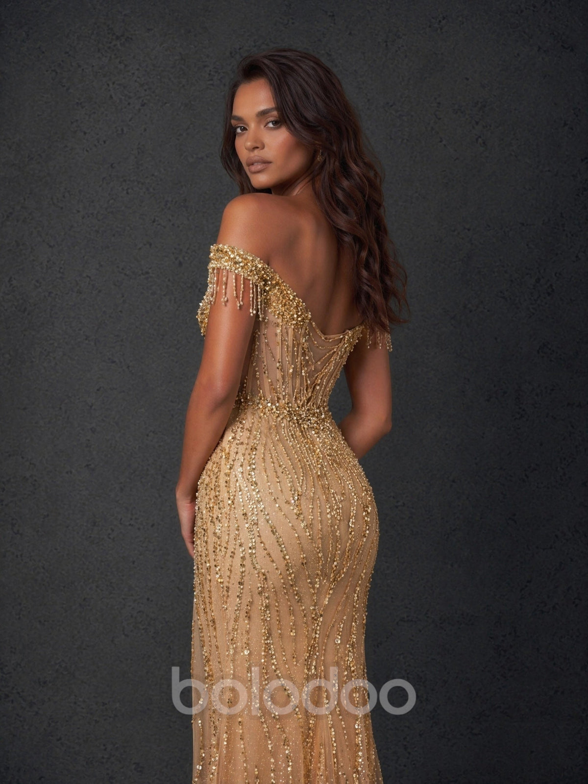 BOLODOO Champagne Gold Wave Sequin Off-Shoulder Beaded Fringe Sheer Corset Lace-Up Back High Slit Mermaid Maxi Dress - Front Full Length Standing View Showing Sheer Corset Bodice and High Slit | BOLODOO watermark