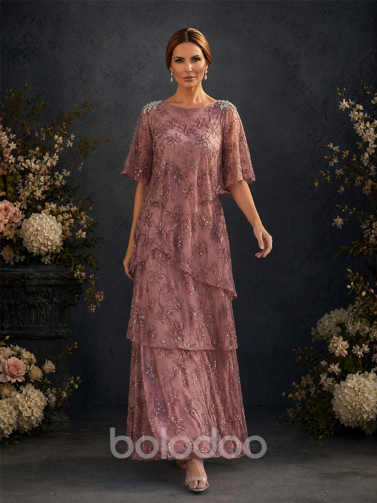 BOLODOO Dusty Rose Flutter Sleeve Sequin Floral Lace Tiered A-Line Gown – Front View Full Length Studio | BOLODOO watermark