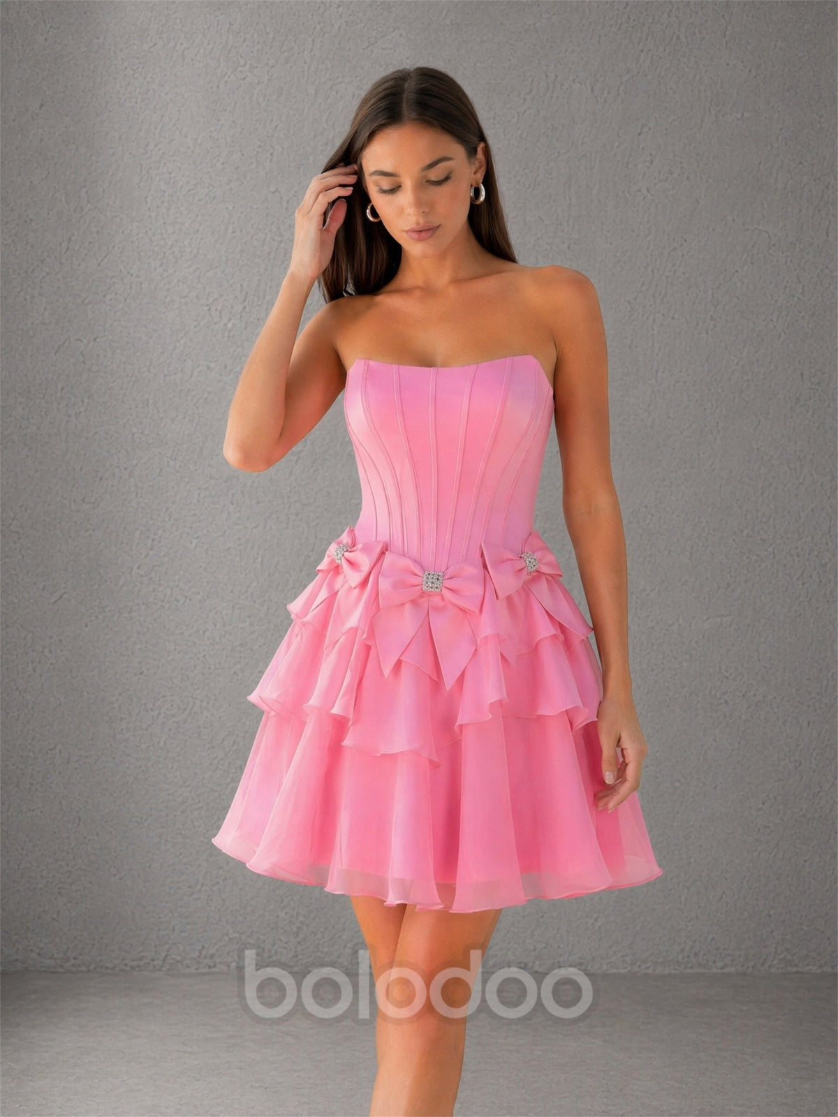 BOLODOO hot pink organza tiered ruffle mini dress - three-quarter front view showing full A-line silhouette | BOLODOO watermark