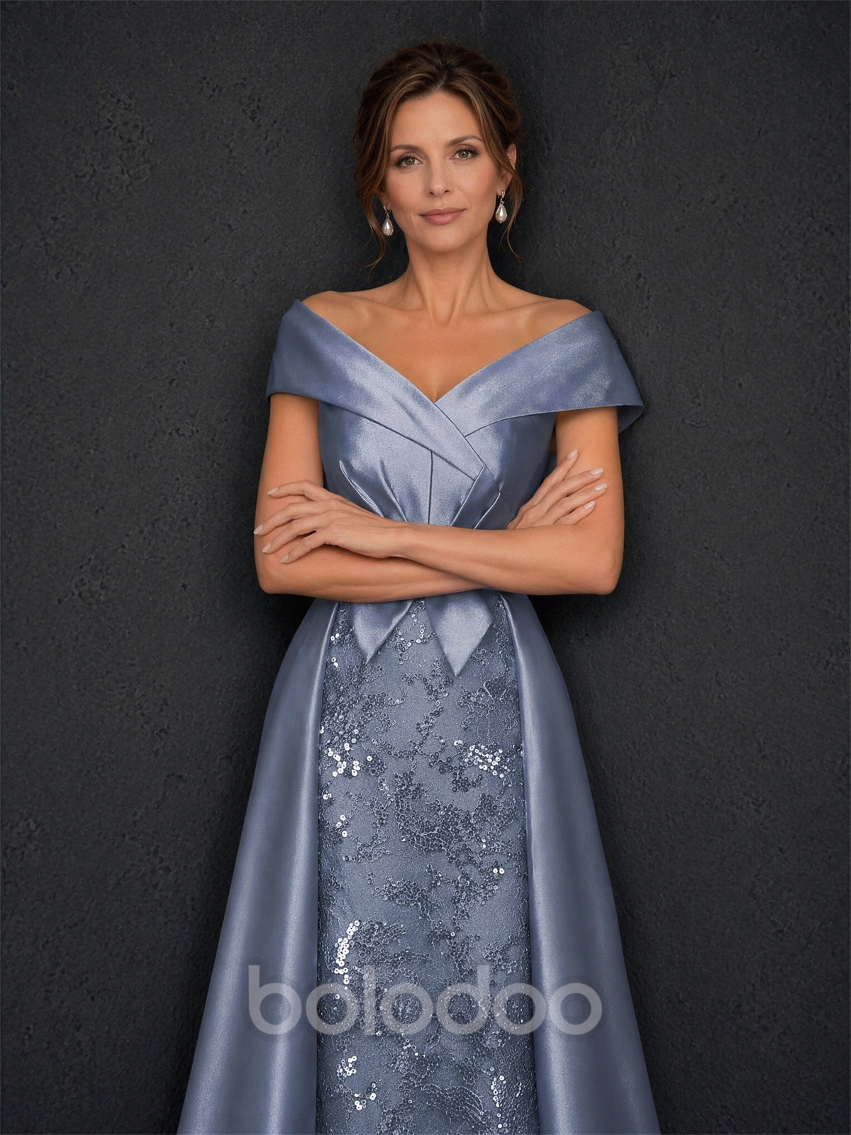 BOLODOO steel blue satin sequin lace gown - front close-up showing draped off-shoulder neckline, cap sleeve and bow waist detail | BOLODOO watermark