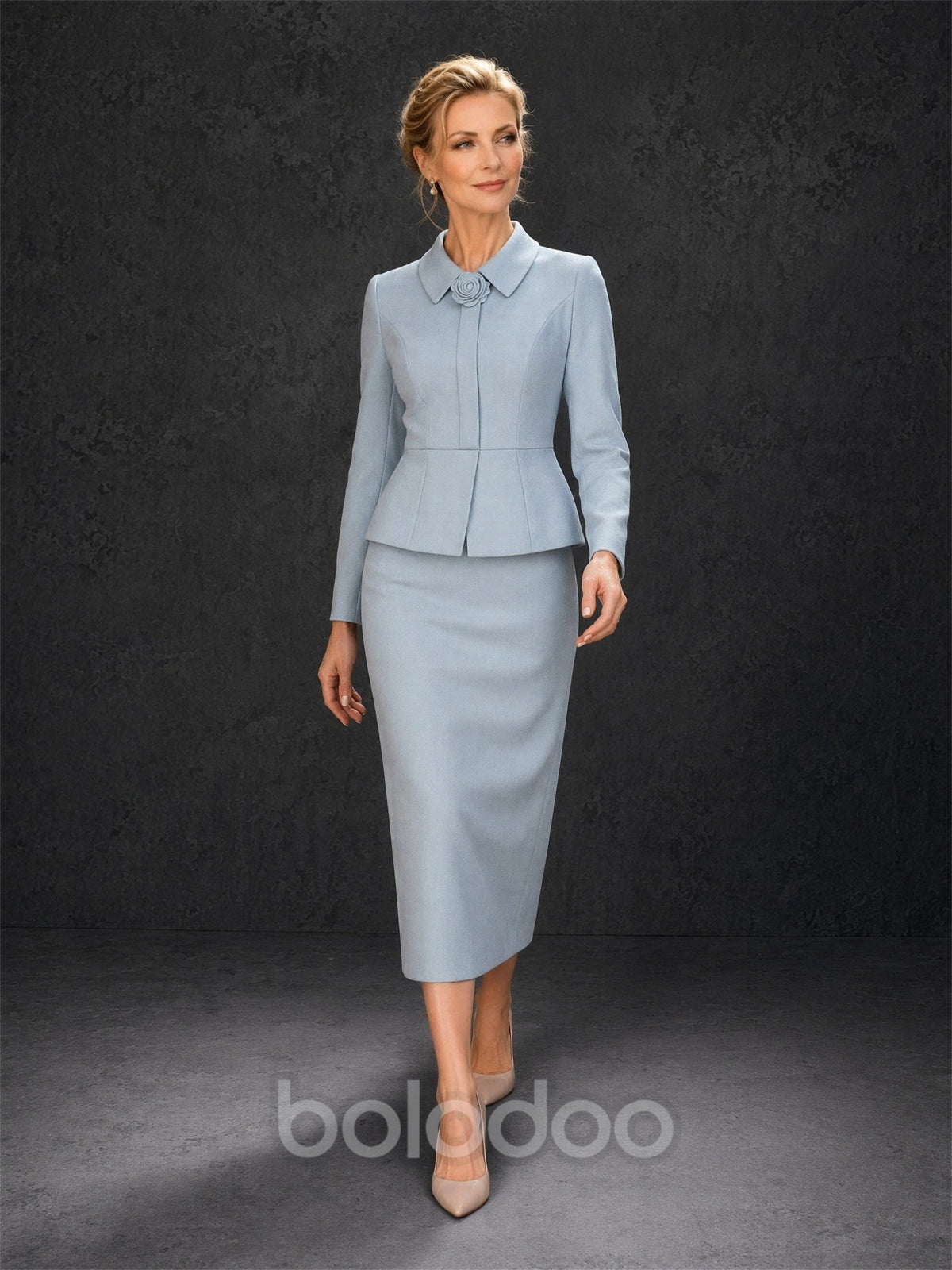 BOLODOO ice blue long sleeve peplum jacket and midi pencil skirt suit - front upper body close-up showing point collar and 3D rose brooch detail | BOLODOO watermark