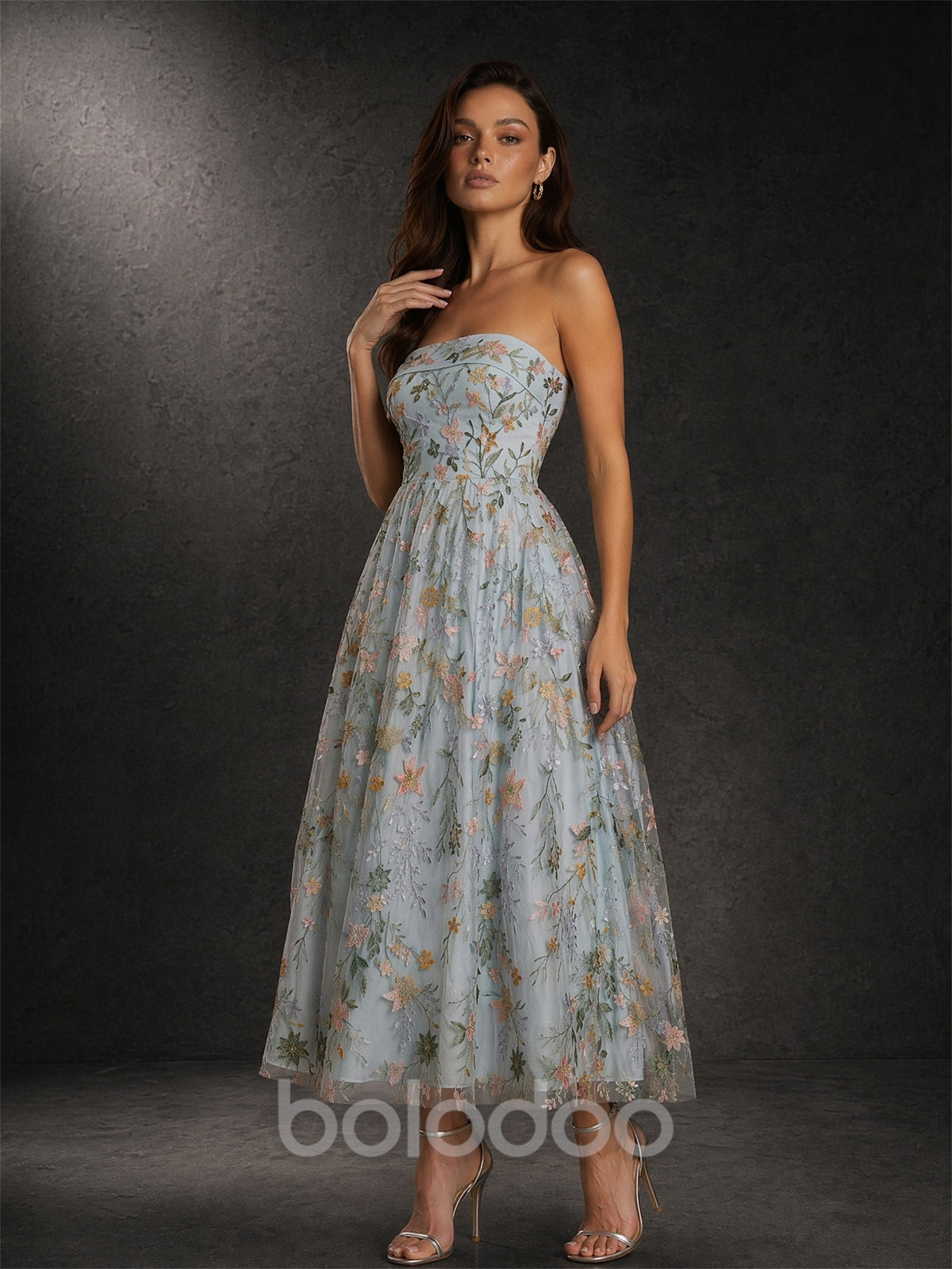 BOLODOO Dusty Blue Floral Embroidered Sequin Tulle Strapless Tea Length Dress - Front Three-Quarter Side View | BOLODOO watermark