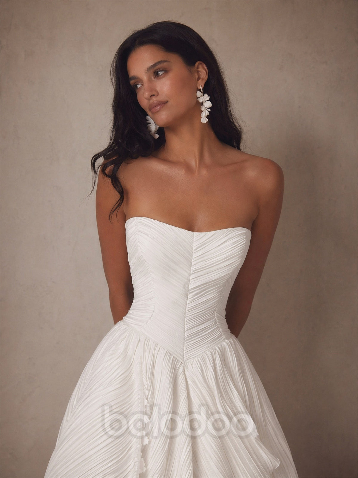 BOLODOO Ivory Crinkle Pleated Chiffon Sweetheart Corset Ball Gown Wedding Dress - Front Upper Body Close-up Looking Up Diagonal Corset Pleating Detail | BOLODOO watermark