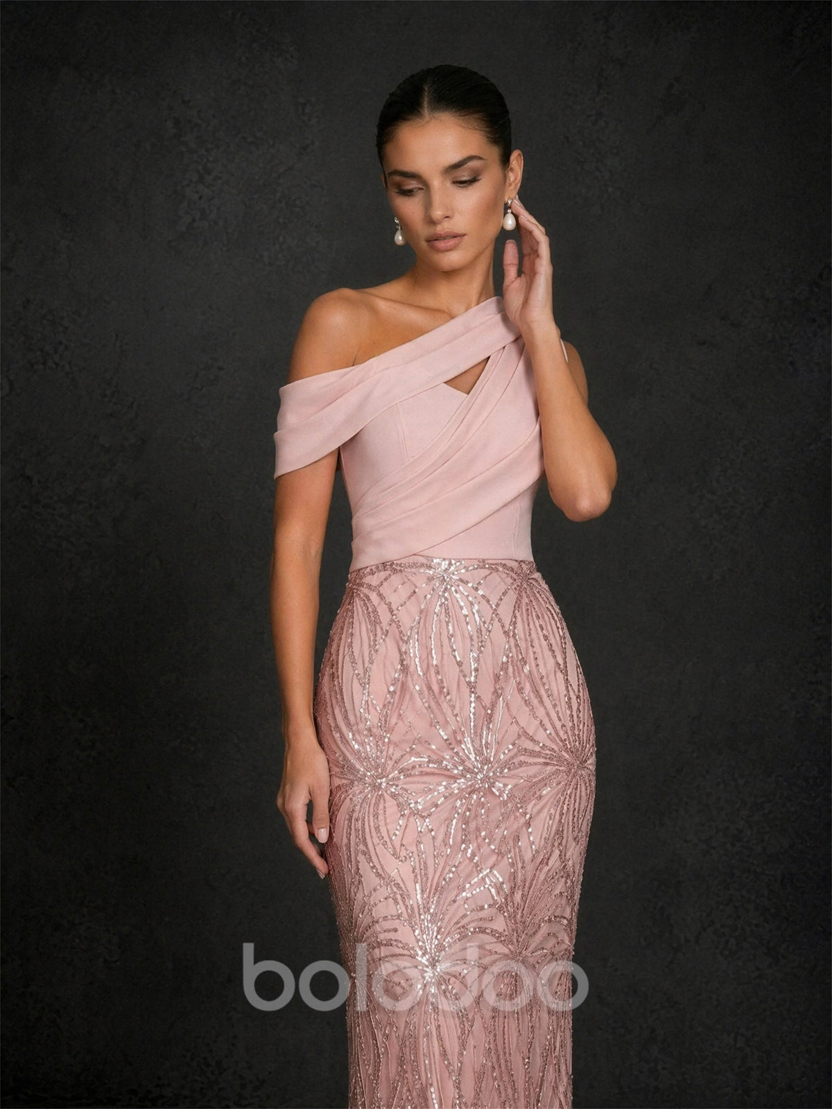 BOLODOO BD0419 blush pink one-shoulder draped chiffon sequin mermaid gown – close-up of keyhole cutout neckline and rose gold geometric sequin skirt detail | BOLODOO watermark
