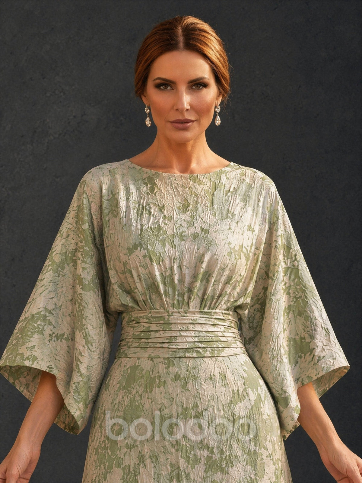 BOLODOO sage green champagne gold floral jacquard bateau neck batwing kimono sleeve A-line floor length gown with ruched wide waistband – front full length direct gaze view | BOLODOO watermark