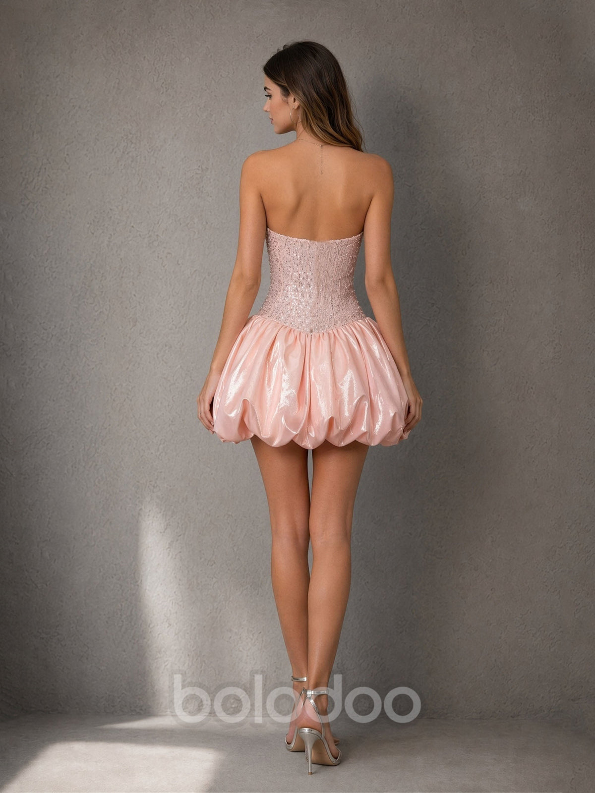BOLODOO blush pink dense sequin boned corset bodice satin bubble lantern mini dress – back full length view showing fully open strapless back and bubble skirt | BOLODOO watermark