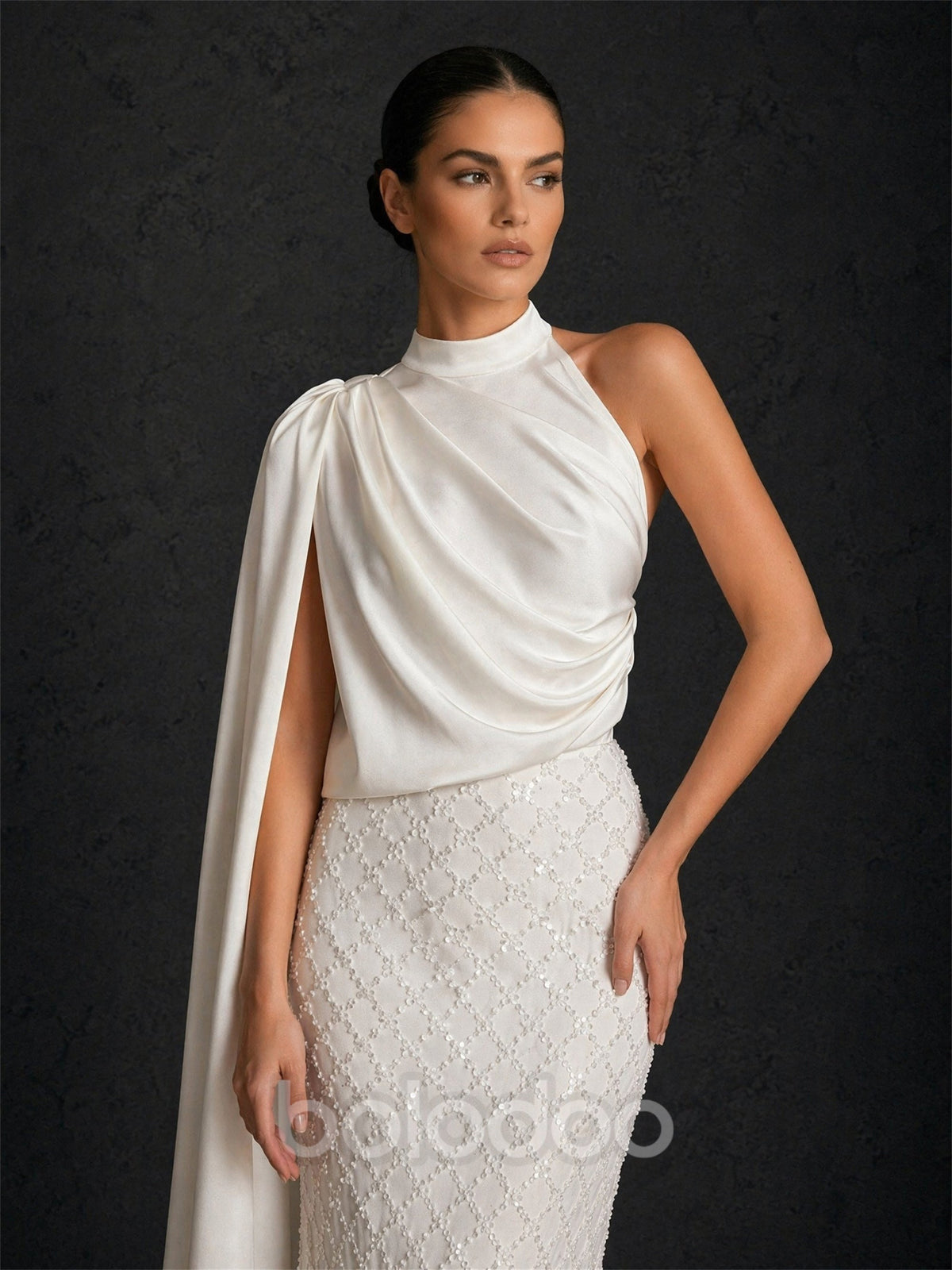 BOLODOO ivory one shoulder cape gown – front standing full length view with beaded skirt | BOLODOO watermark
