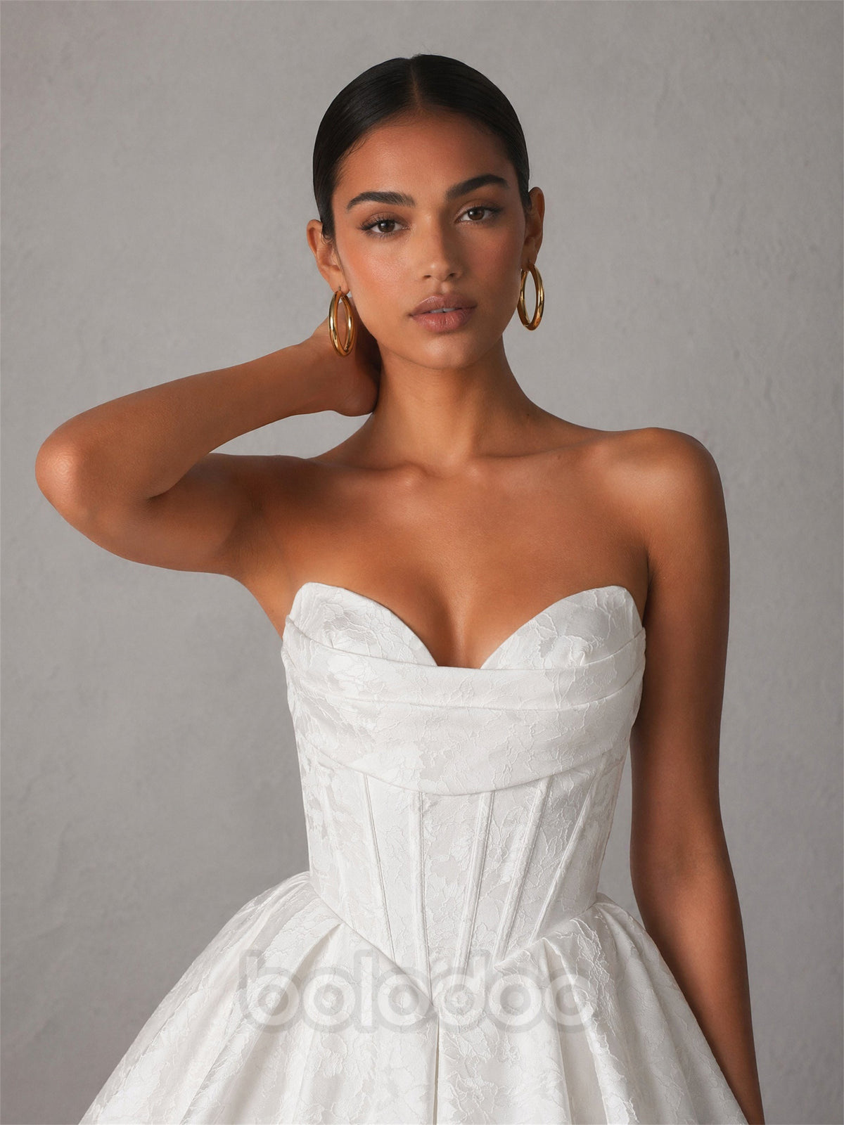 BOLODOO white strapless bubble mini dress - back view showing lace-up corset detail | BOLODOO watermark