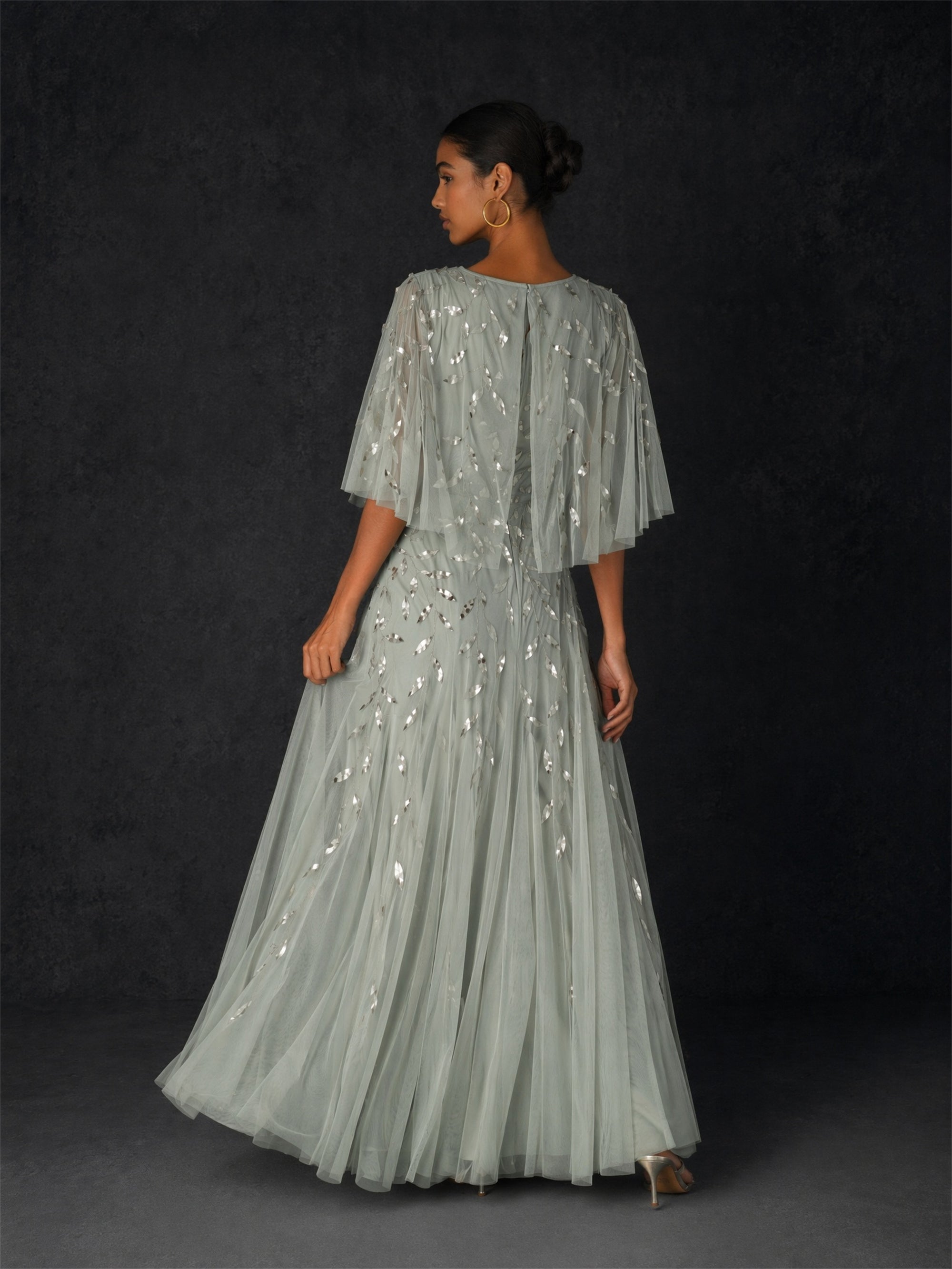 BOLODOO sage green sequin leaf embroidered flutter sleeve maxi dress - front full length side pose showing flutter sleeve detail