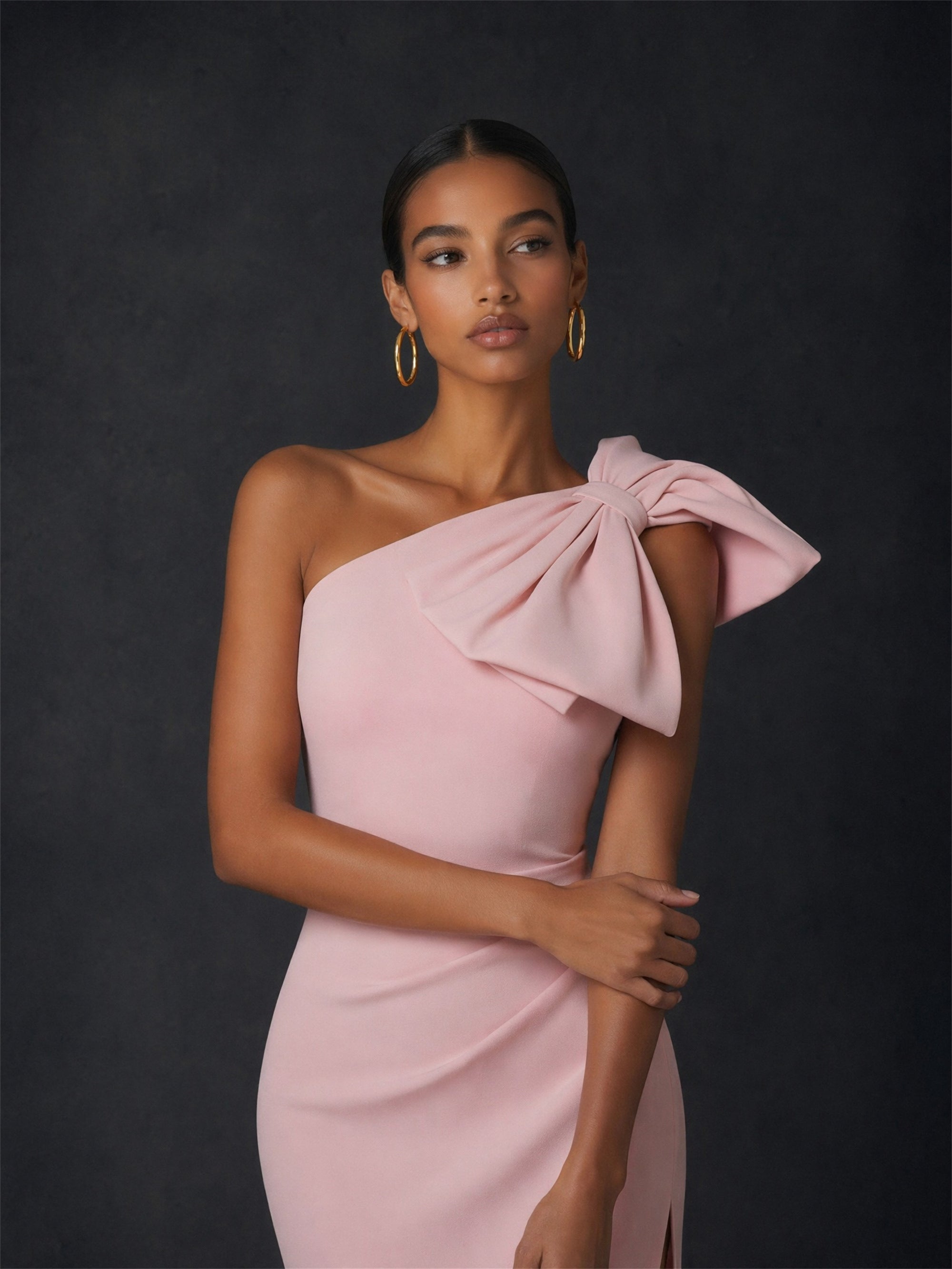 BOLODOO blush pink one-shoulder bow maxi dress - front half body close-up showing oversized bow shoulder detail