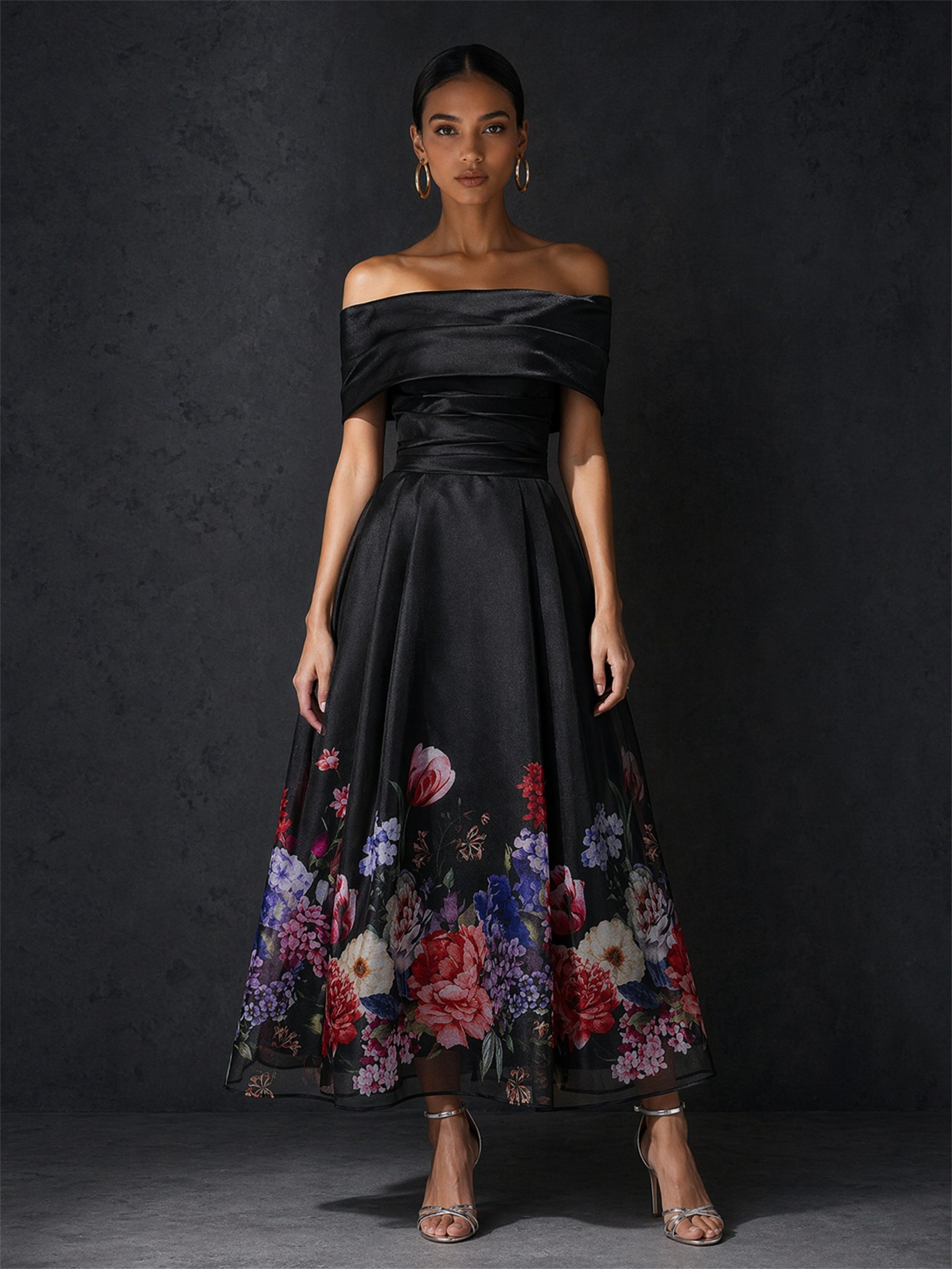 BOLODOO black off-shoulder floral print midi dress - front view showing full A-line silhouette and botanical border print