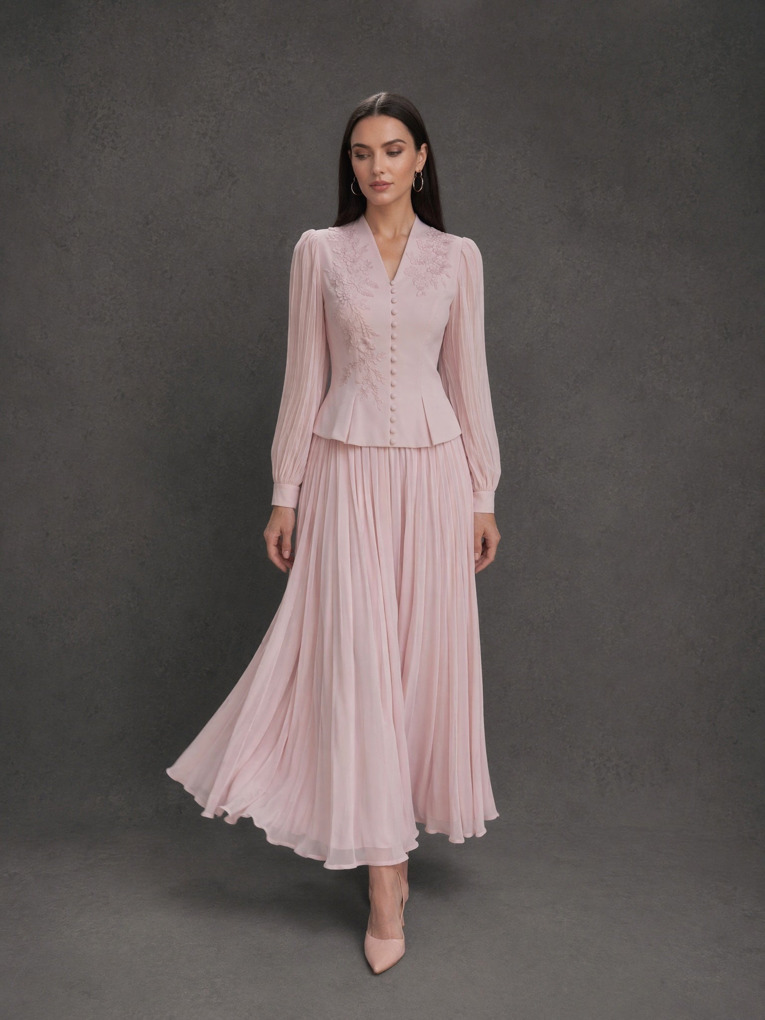 BOLODOO Blush Pink Chiffon Long Sleeve Peplum Pleated Maxi Dress - Front View with Flowing Skirt