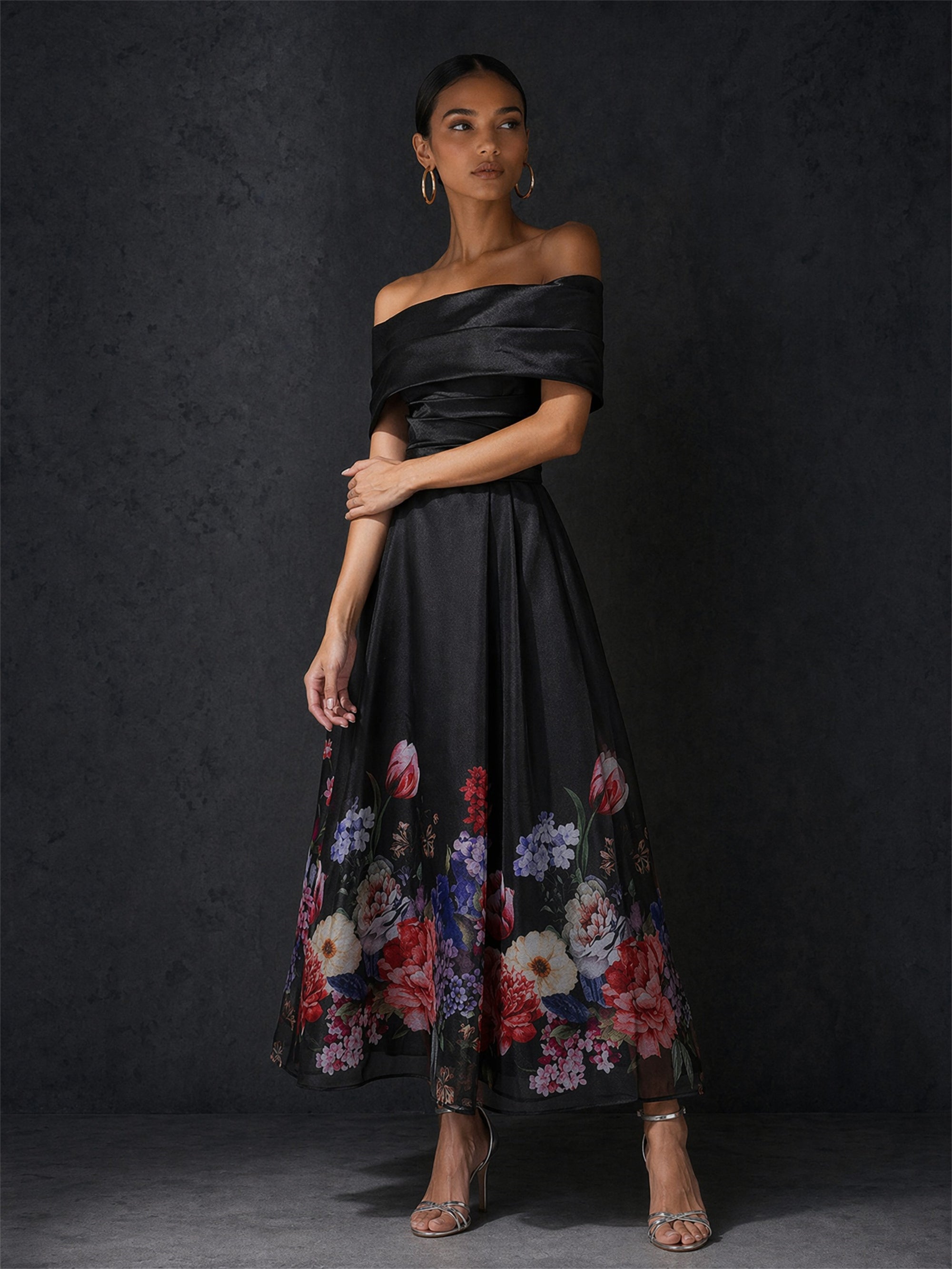BOLODOO black off-shoulder floral dress - three-quarter front view showing draped crossover bodice detail