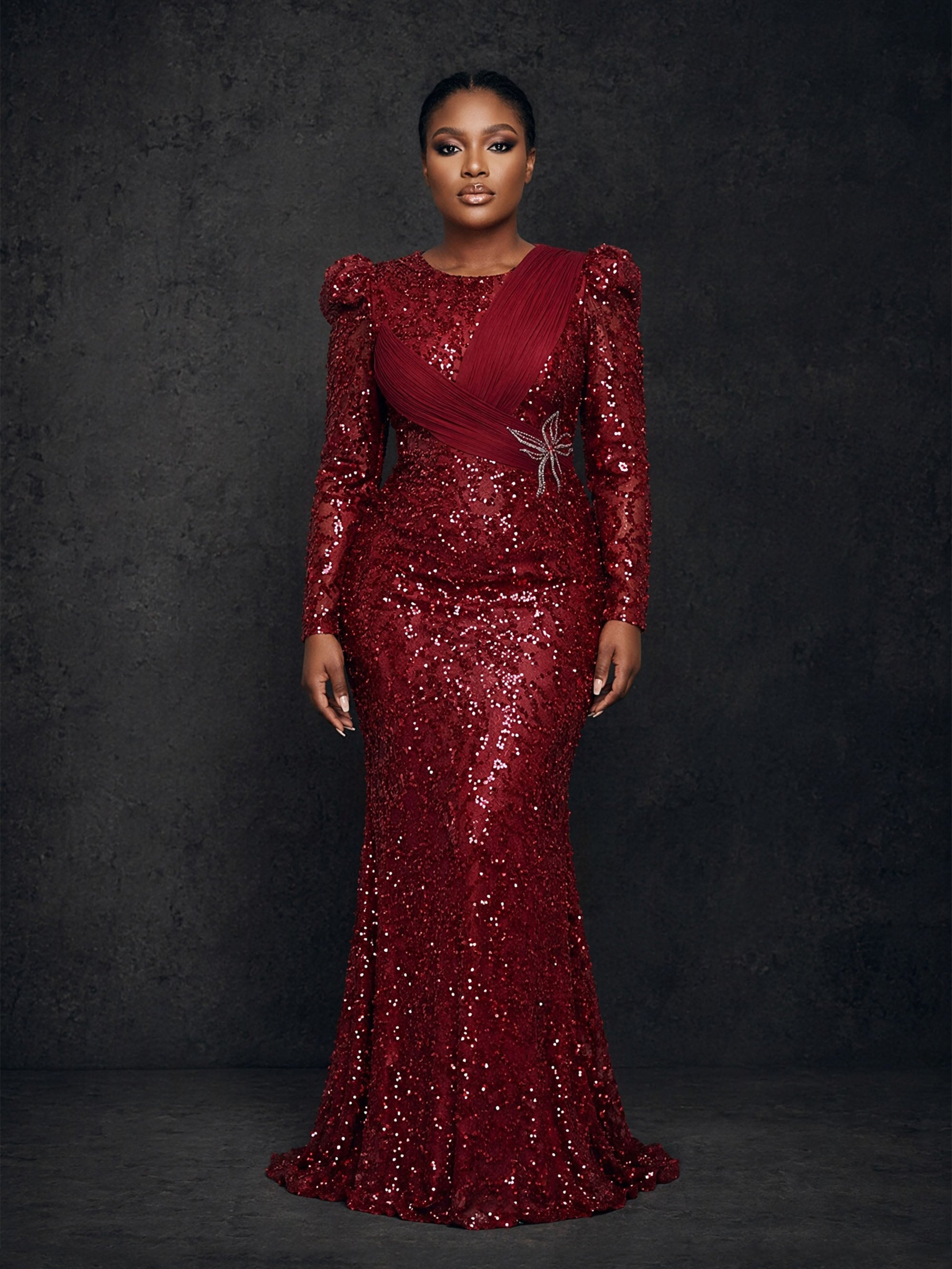 BOLODOO burgundy sequin long sleeve puff shoulder mermaid maxi dress - full length front view with crystal brooch
