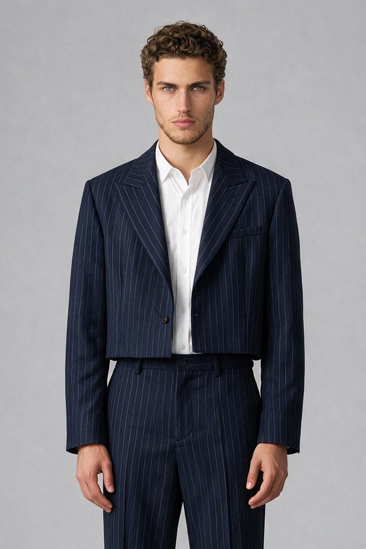 Bolodoo navy pinstripe two-piece men's suit with high-waisted wide-leg trousers, three-quarter view