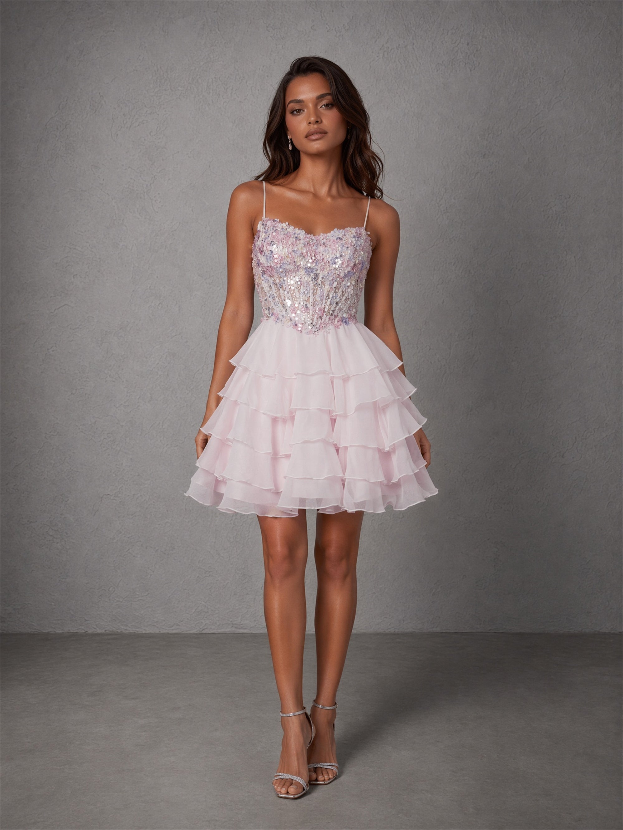 BOLODOO blush pink sequin corset tiered ruffle mini dress - front close-up showing iridescent lavender silver sequin floral embroidery bodice detail
