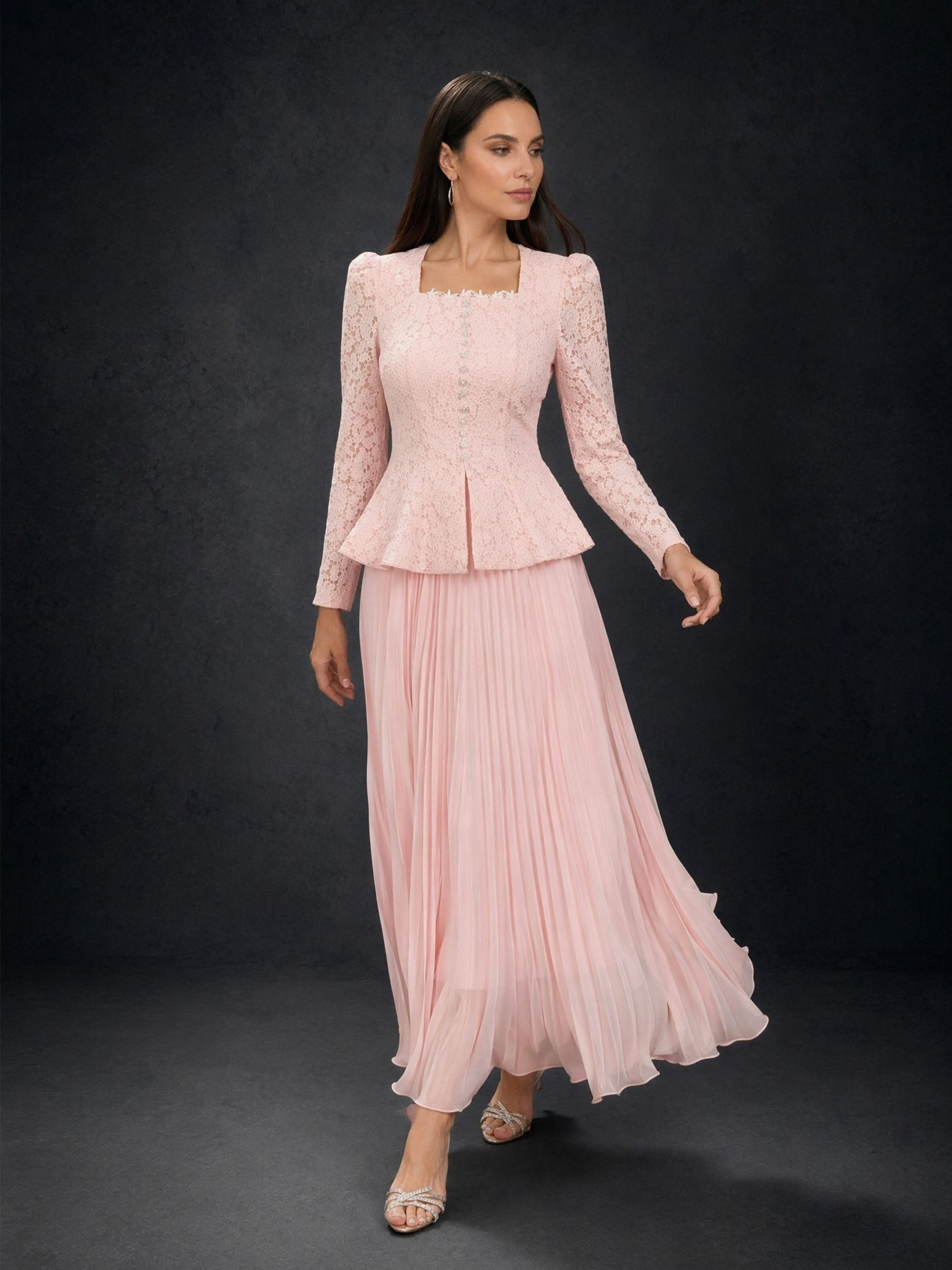 BOLODOO Blush Pink Lace Long Sleeve Peplum Pleated Maxi Dress - Front View with Flowing Skirt