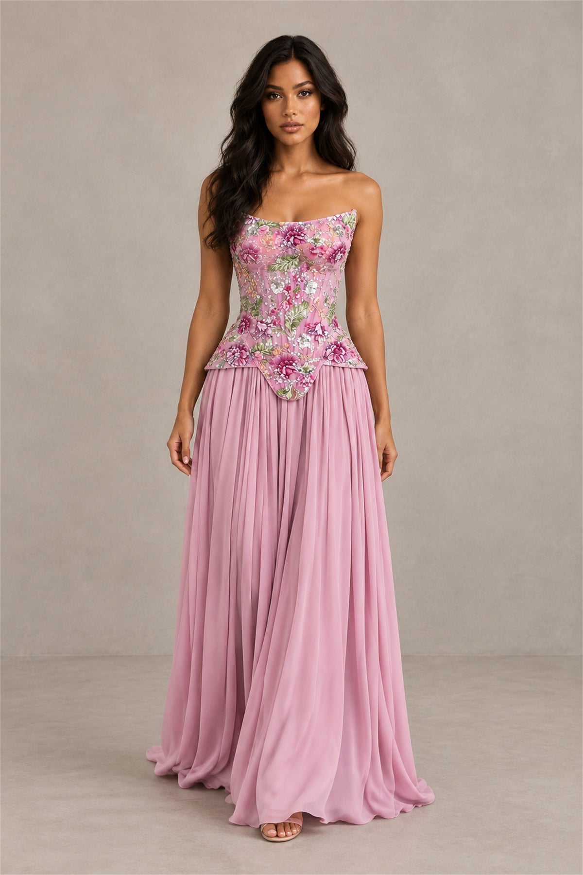 Close-up of pink floral embroidery beadwork and sequins on fitted gown bodice