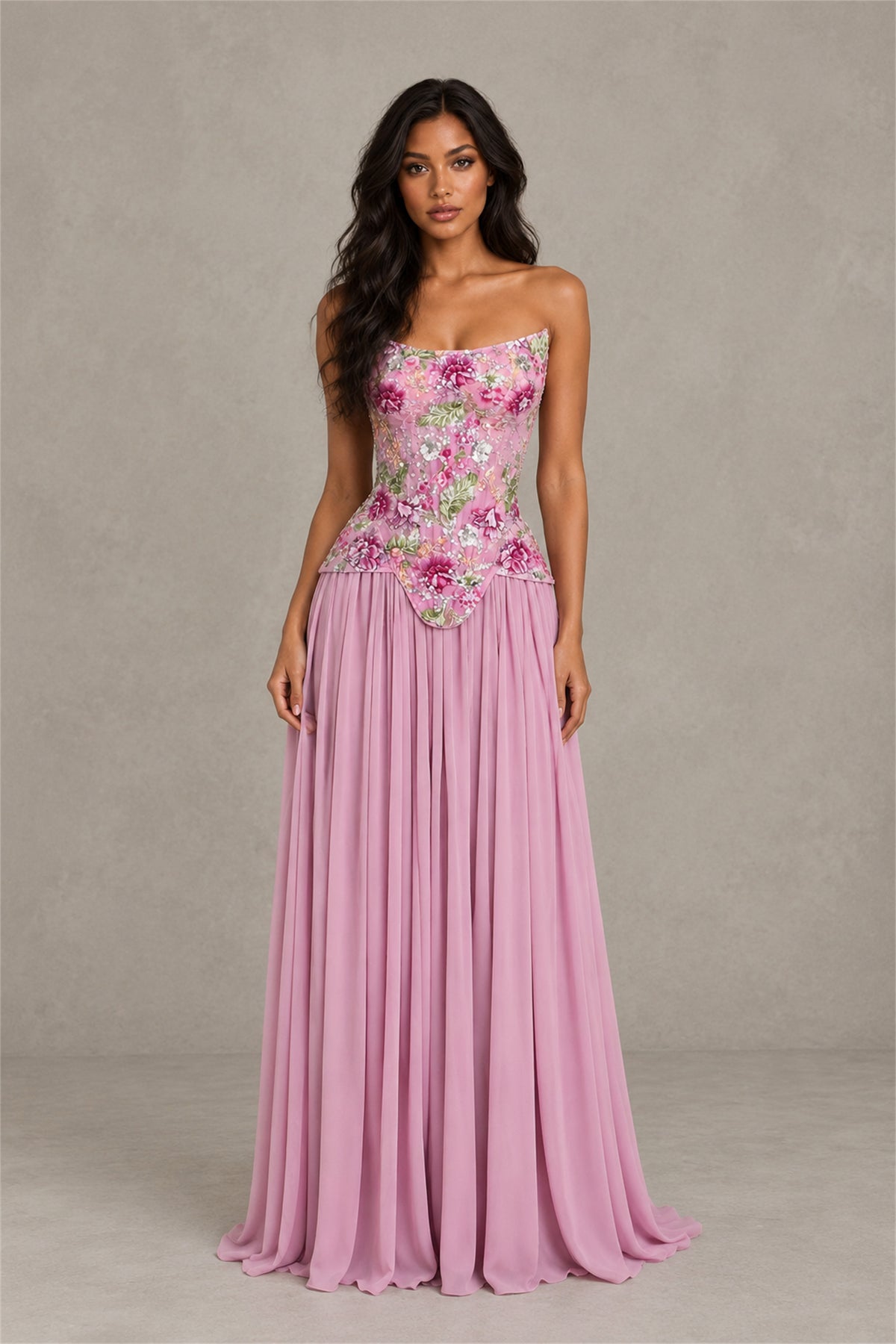 Front view of pink strapless evening gown with floral embellished bodice and pleated skirt