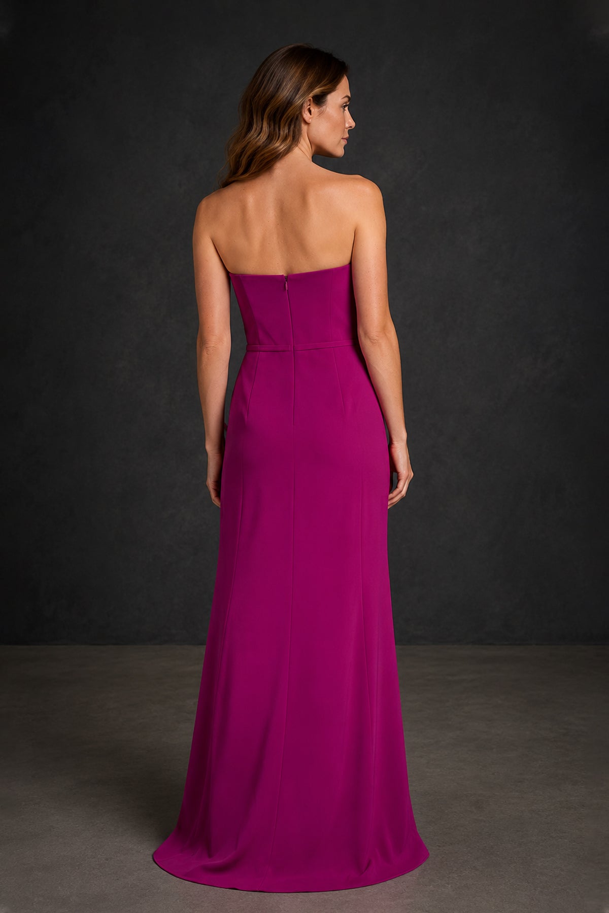BOLODOO XX077 magenta floor-length formal dress three-quarter view showing sculptural bodice and waist ruffles