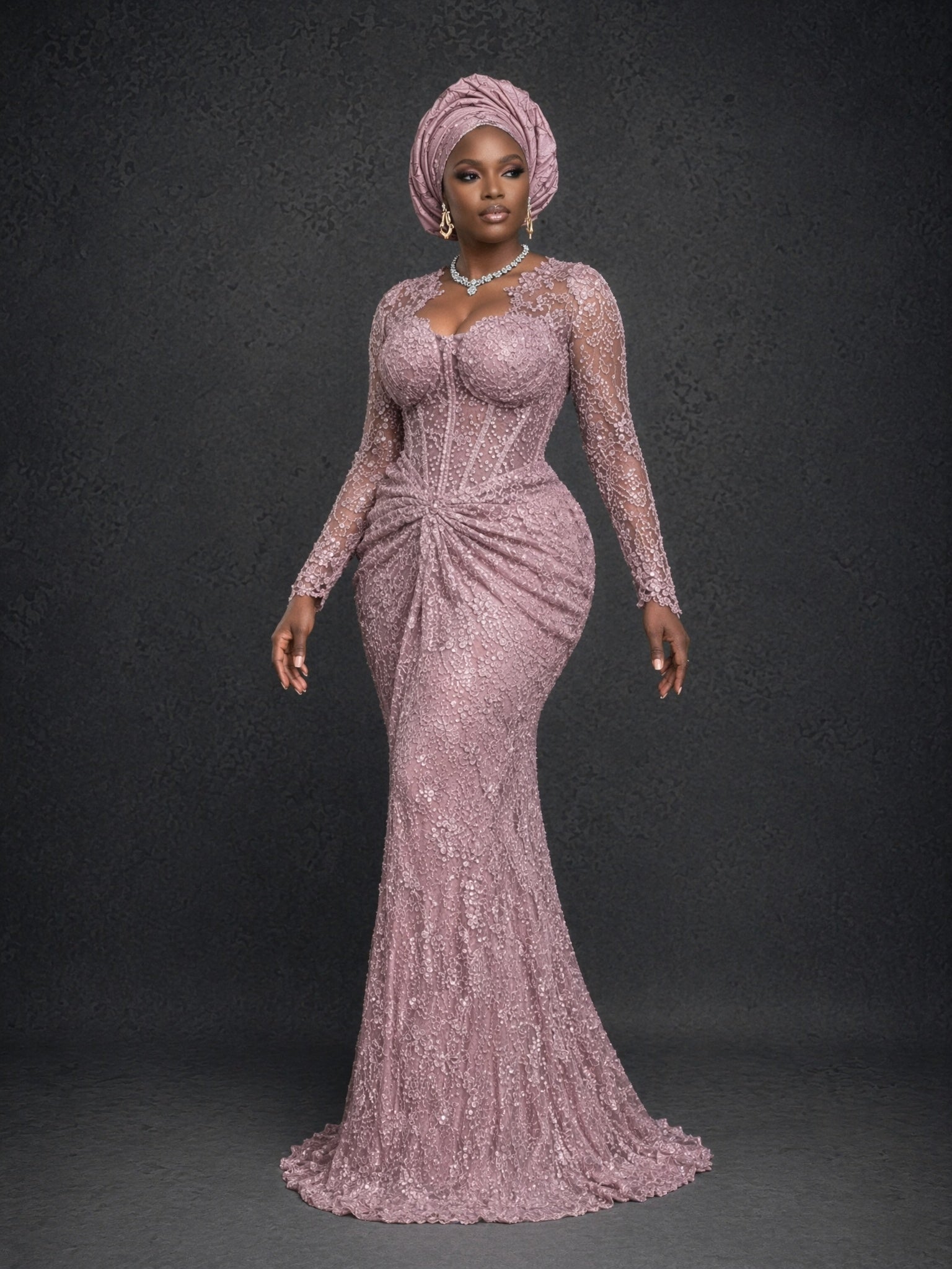 BOLODOO dusty mauve beaded sequin lace long sleeve mermaid gown - front full length side pose showing mermaid silhouette and ruched waist