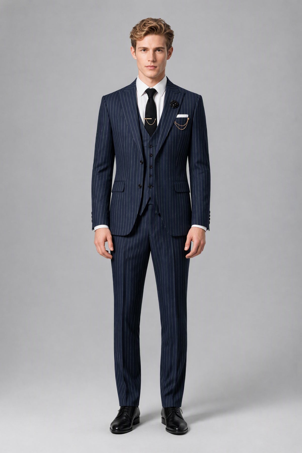 Bolodoo FQ1010 men's navy pinstripe suit with notch lapels and long sleeves, angled detail view