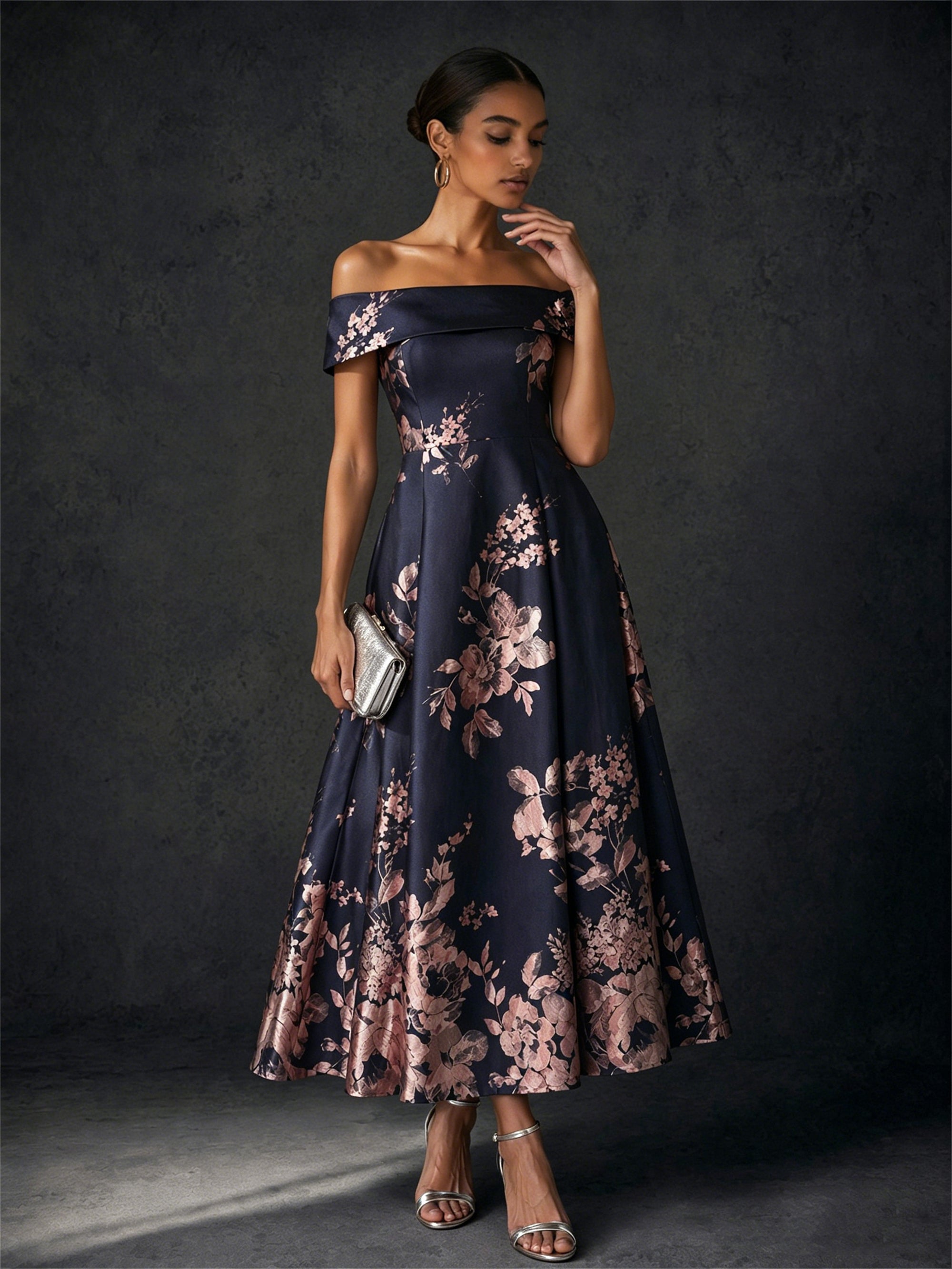 BOLODOO navy blue jacquard floral dress - front view with hand on hip showing floral brocade detail and tea length hem