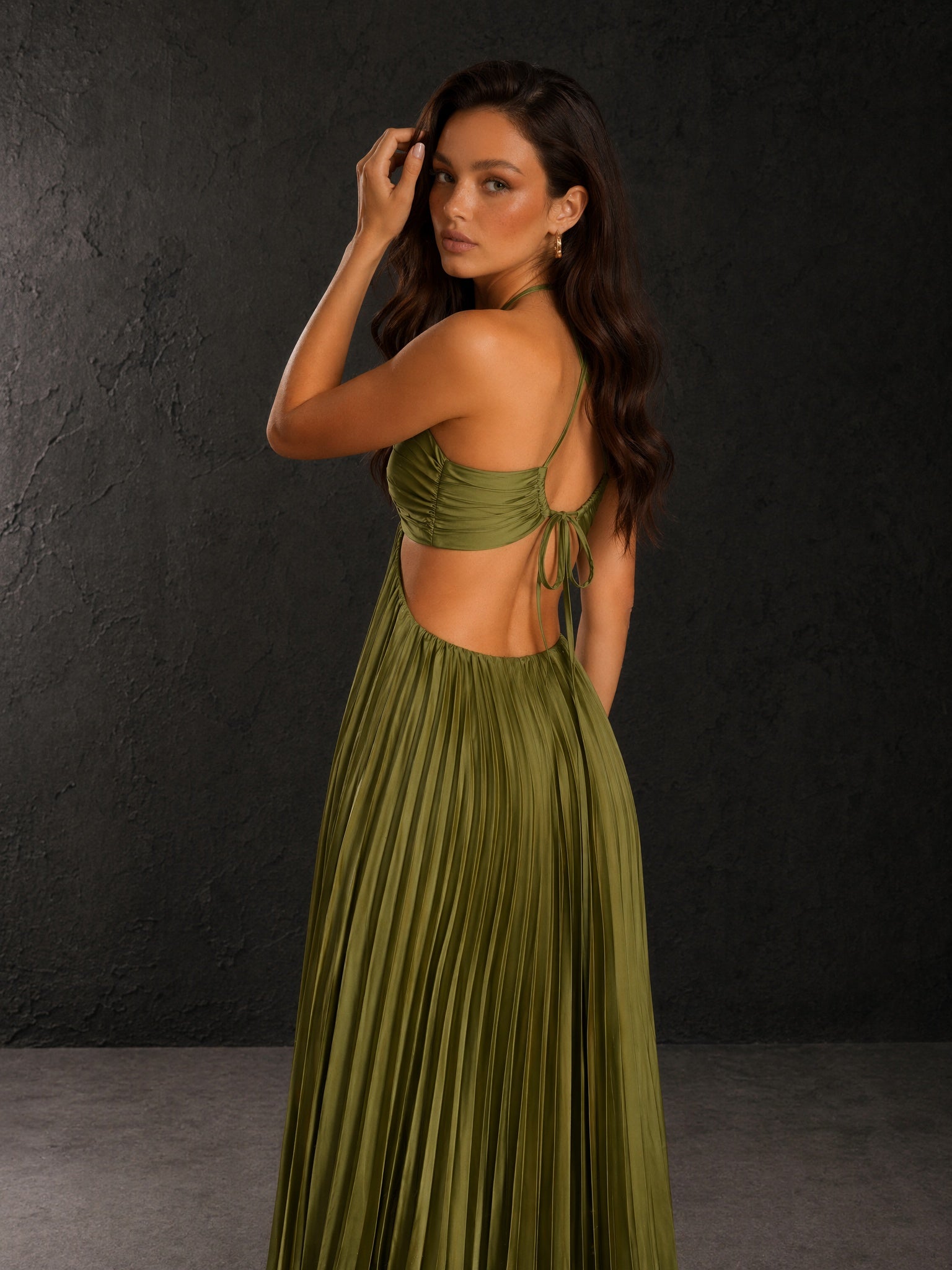 BOLODOO olive green satin halter neck cutout waist pleated A-line backless maxi dress - front full length view