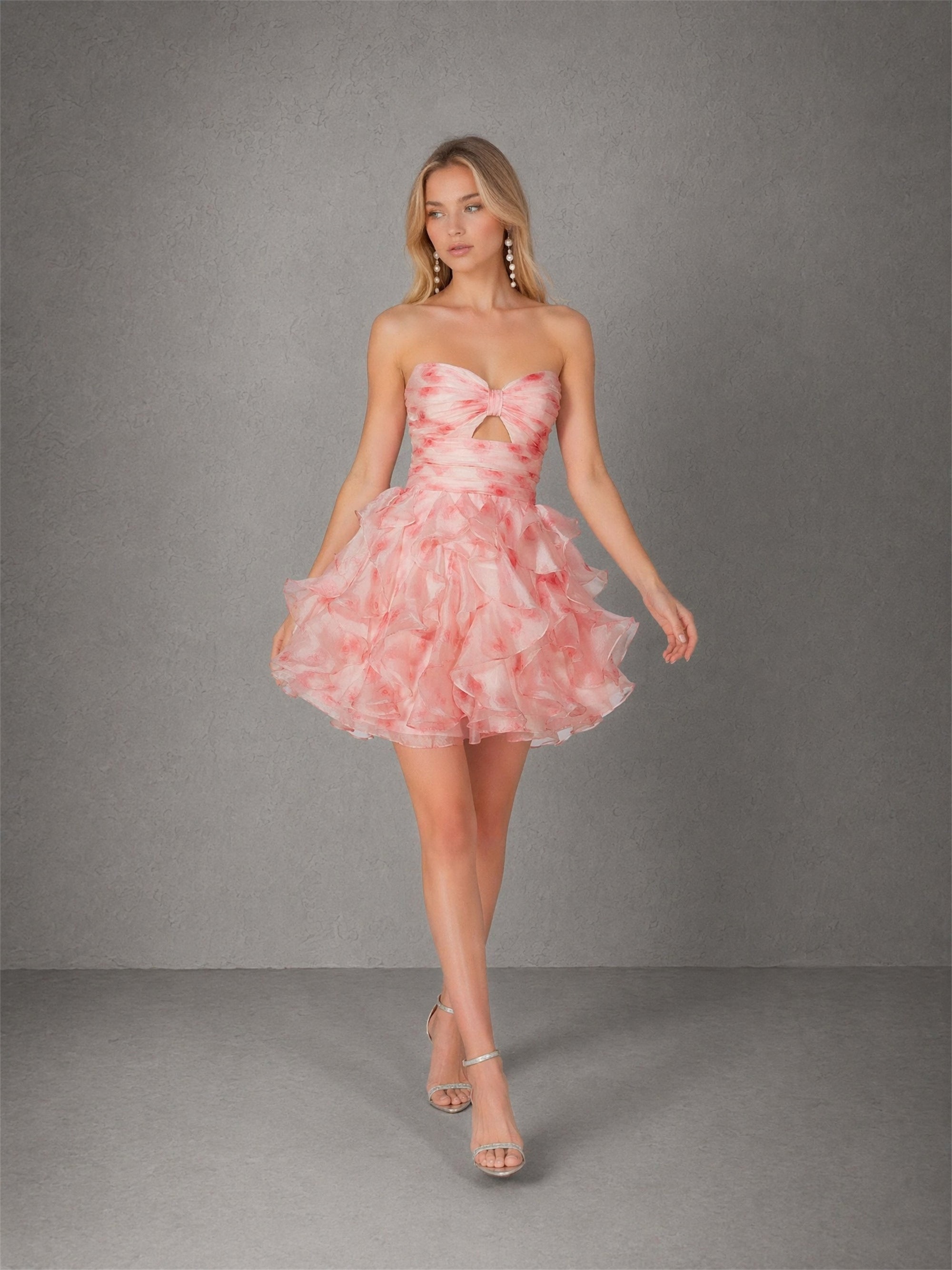 BOLODOO pink floral organza ruffle mini dress - front walking view showing voluminous tiered ruffle skirt movement and rose floral print
