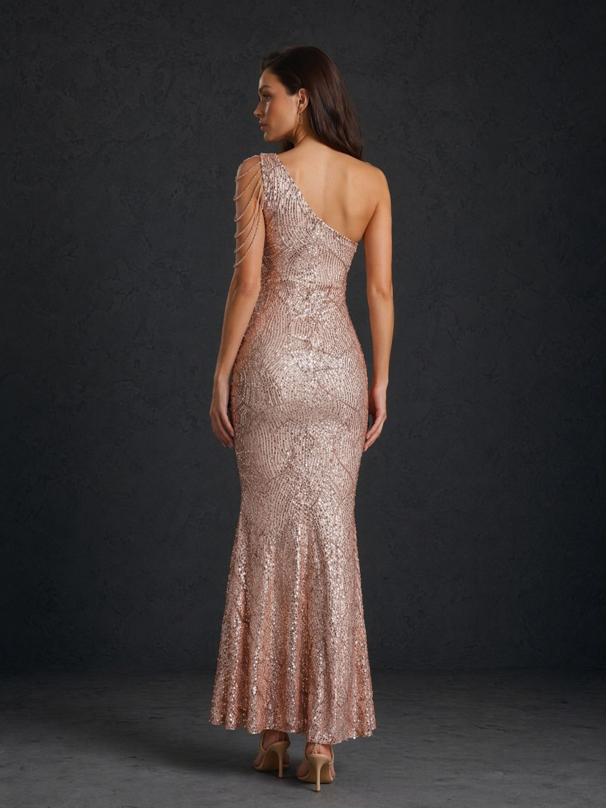 BOLODOO Rose Gold Geometric Wave Sequin One-Shoulder Cutout Multi-Strand Chain Drape Low Open Back Mermaid Maxi Dress - Front Full Length Walking View Showing Chain Drape Movement and Silhouette