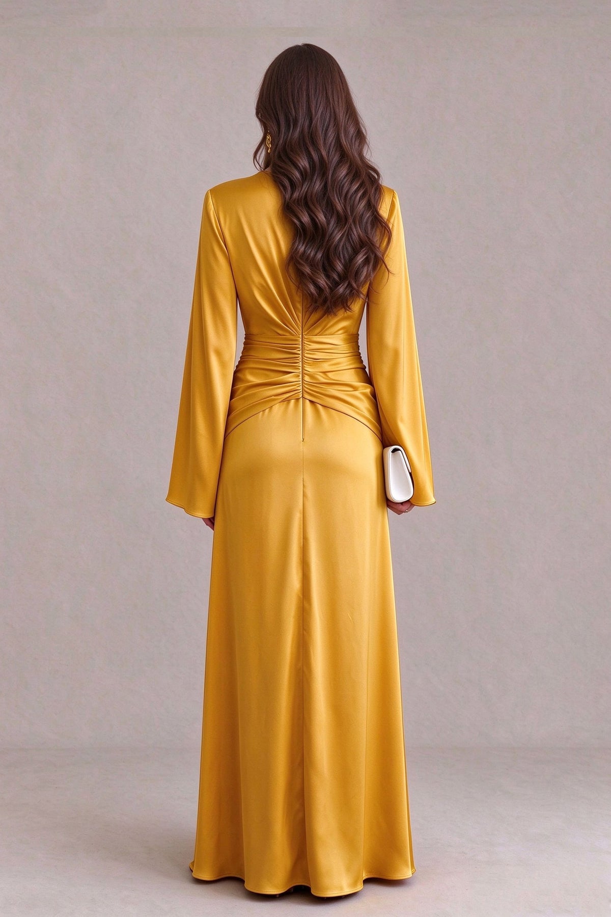 BOLODOO FQ0064 golden yellow long bell sleeve evening dress showing the flowing skirt and satin-like sheen, side view